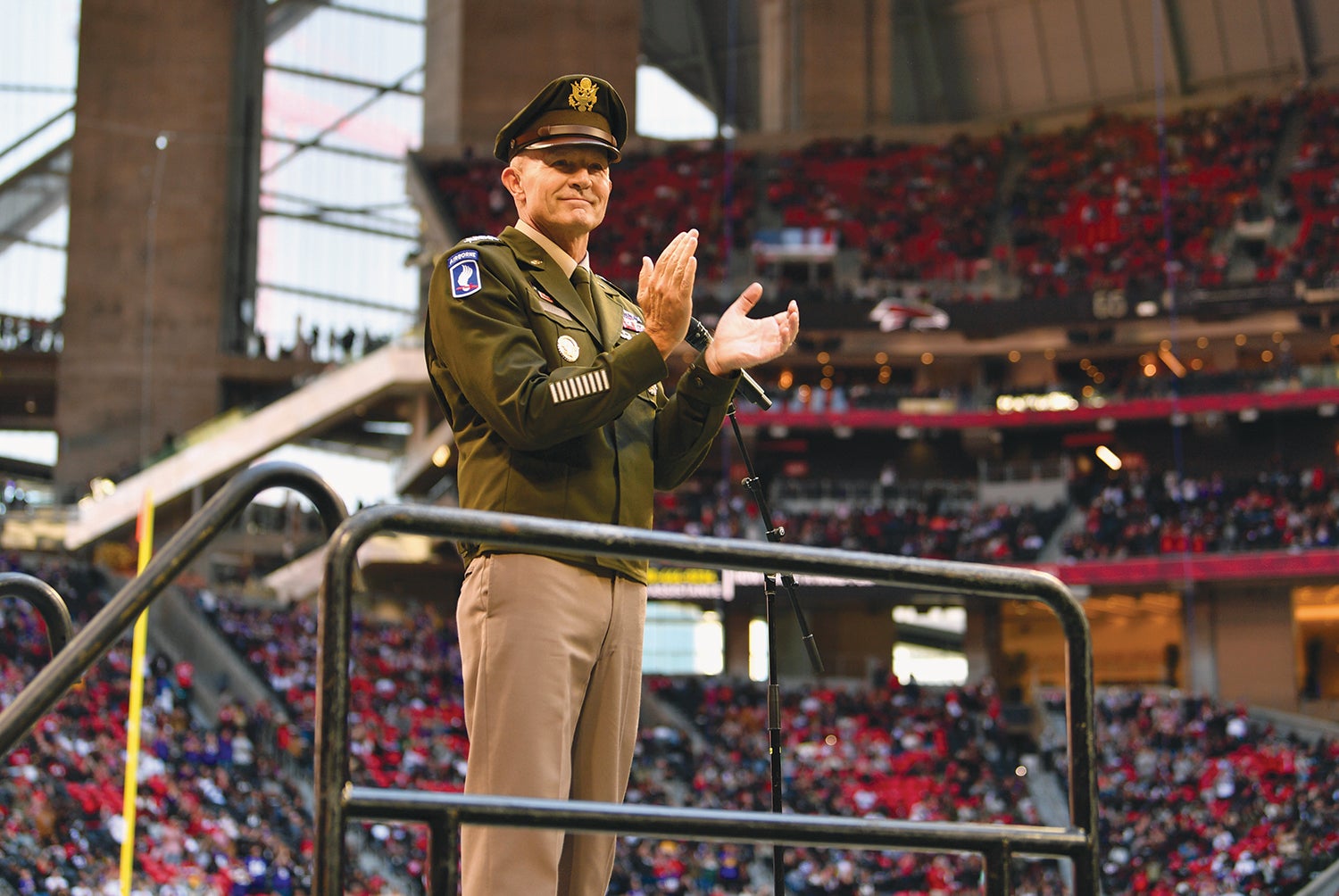 Army Chief of Staff Gen. Randy George administers the oath of enlistment to more than 600 new recruits and current service members during the NFL’s Call To Service event at Mercedes-Benz Stadium in Atlanta. (Credit: U.S. Army/Sgt. 1st Class Alexander Agrinsoni)