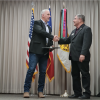 Chris Doneski receiving Community Partner Certificate for BAE Systems - Austin