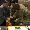 Cutting the cake, COL (R) Patterson, SPC Torres and BG Ulis