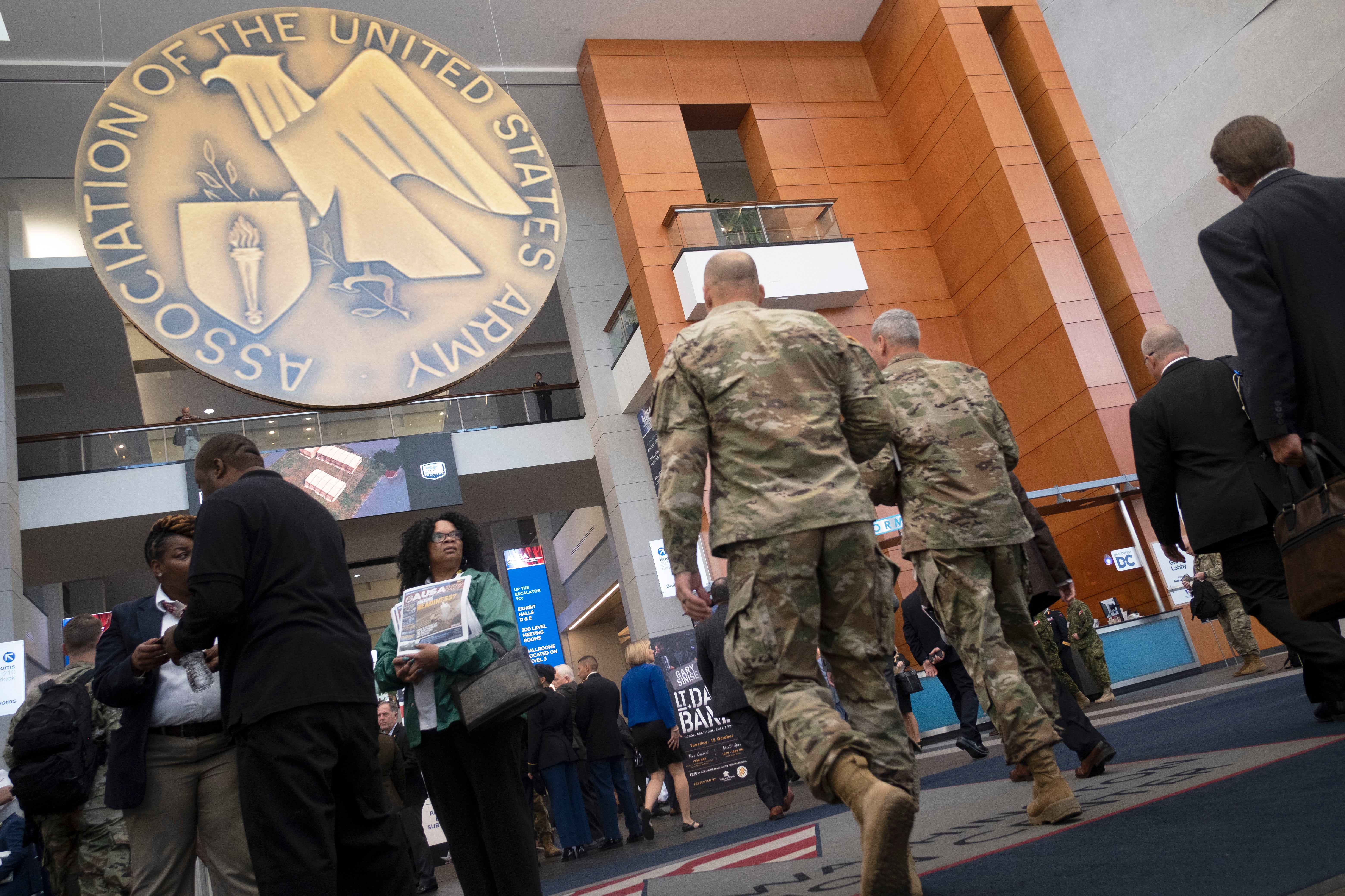 Attendees arrive to register on the opening day of 2019 AUSA Annual Meting and Exposition at the Washington Convention Center on Oct. 14, 2019.