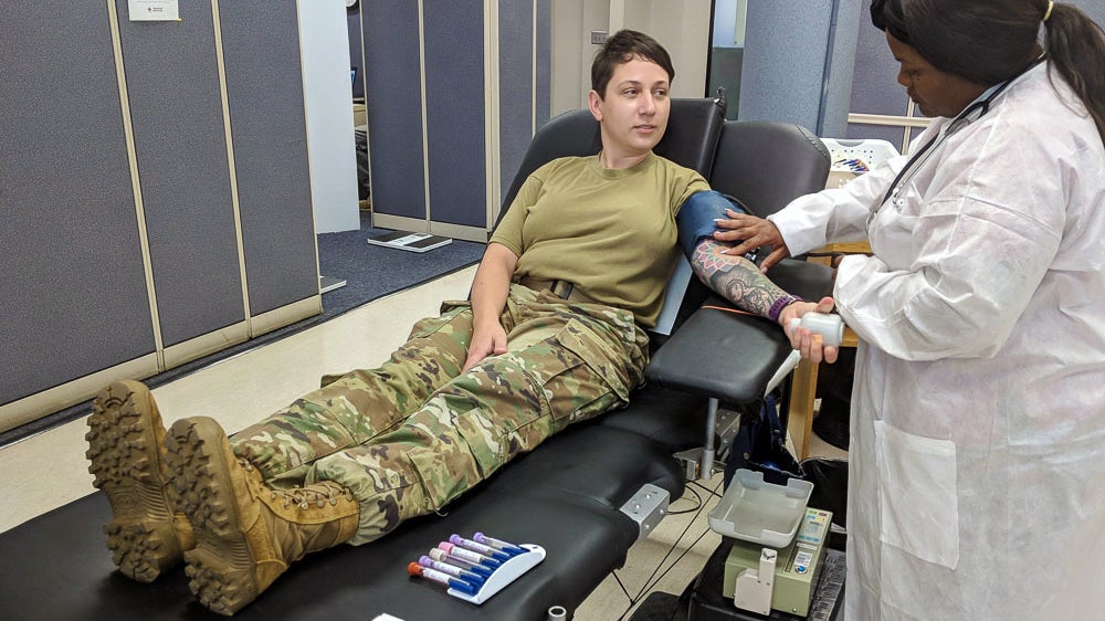 soldier giving blood