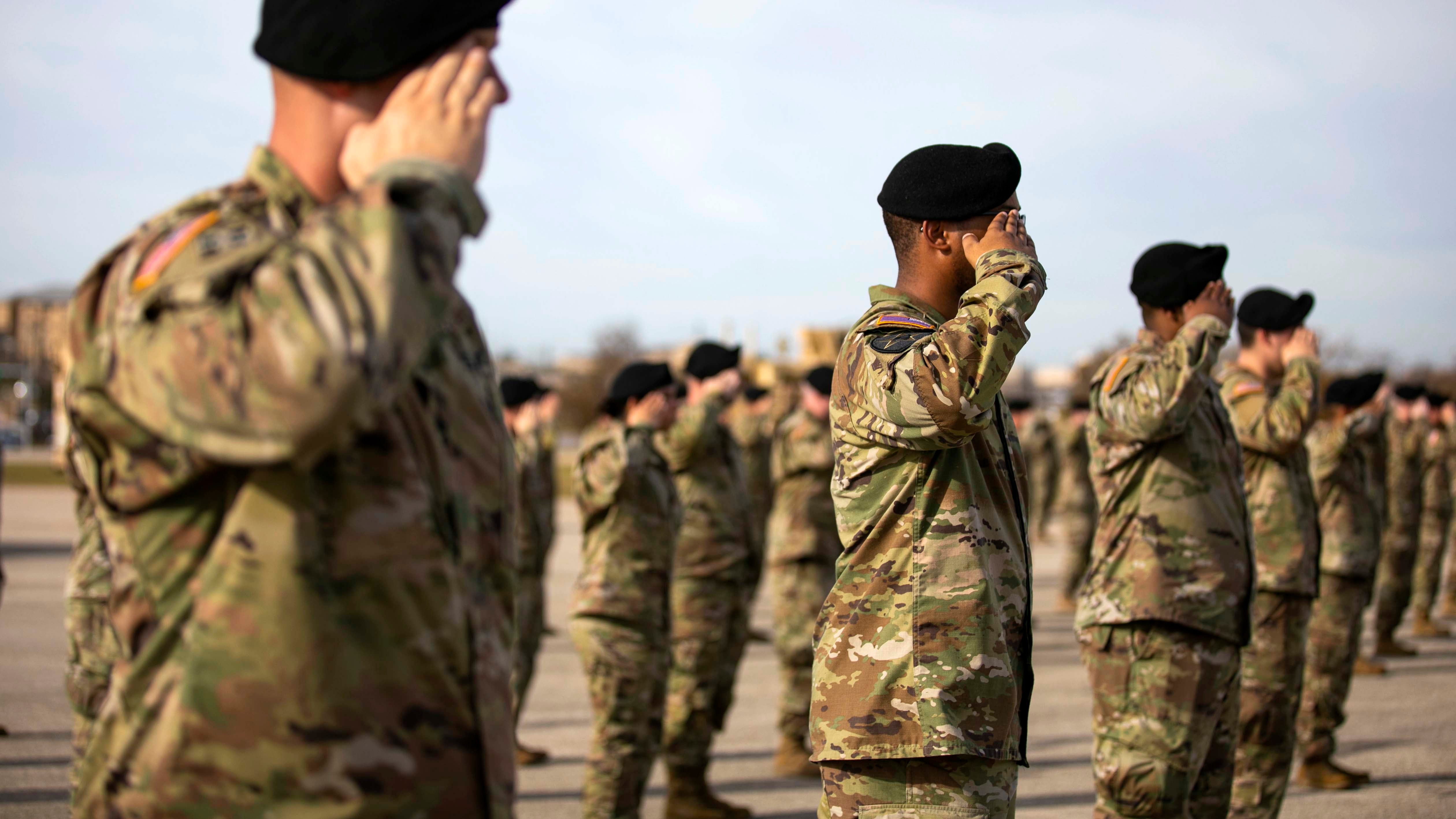 Soldiers saluting