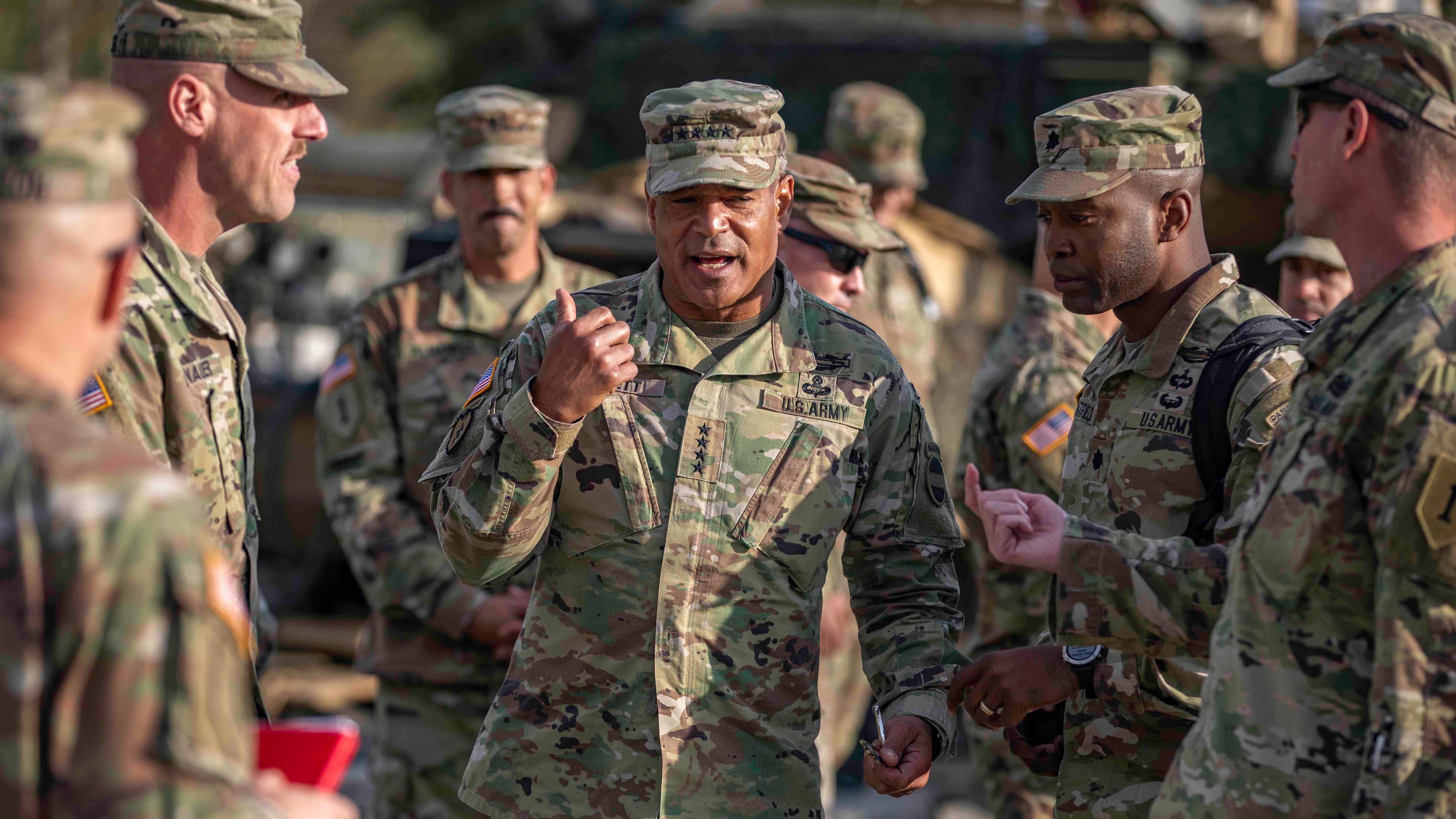 Gen. Michael Garrett talks to soldiers.