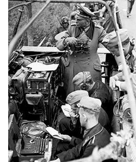 WW2 German radio team with Enigma machine