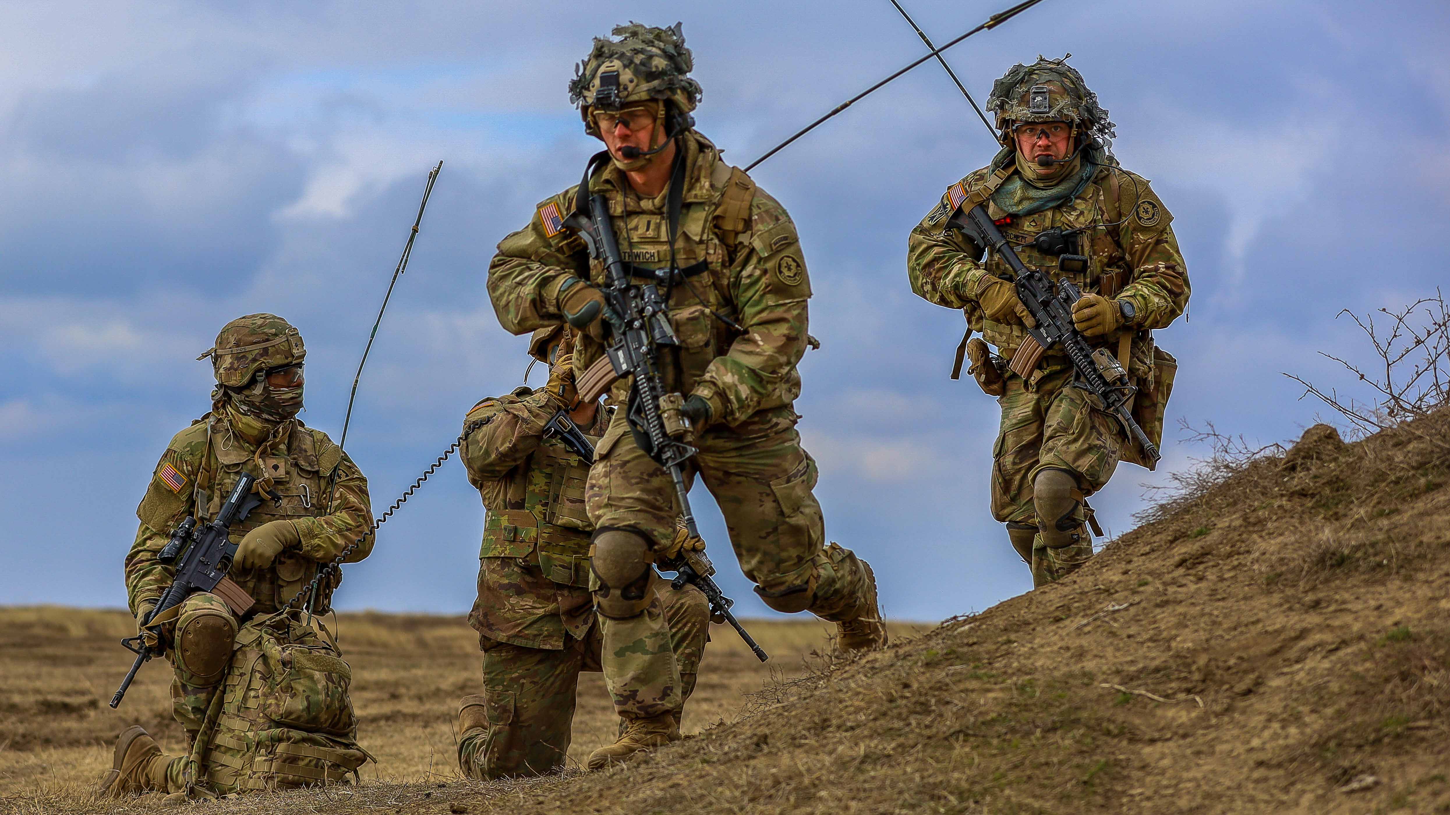 Soldiers move forward during training