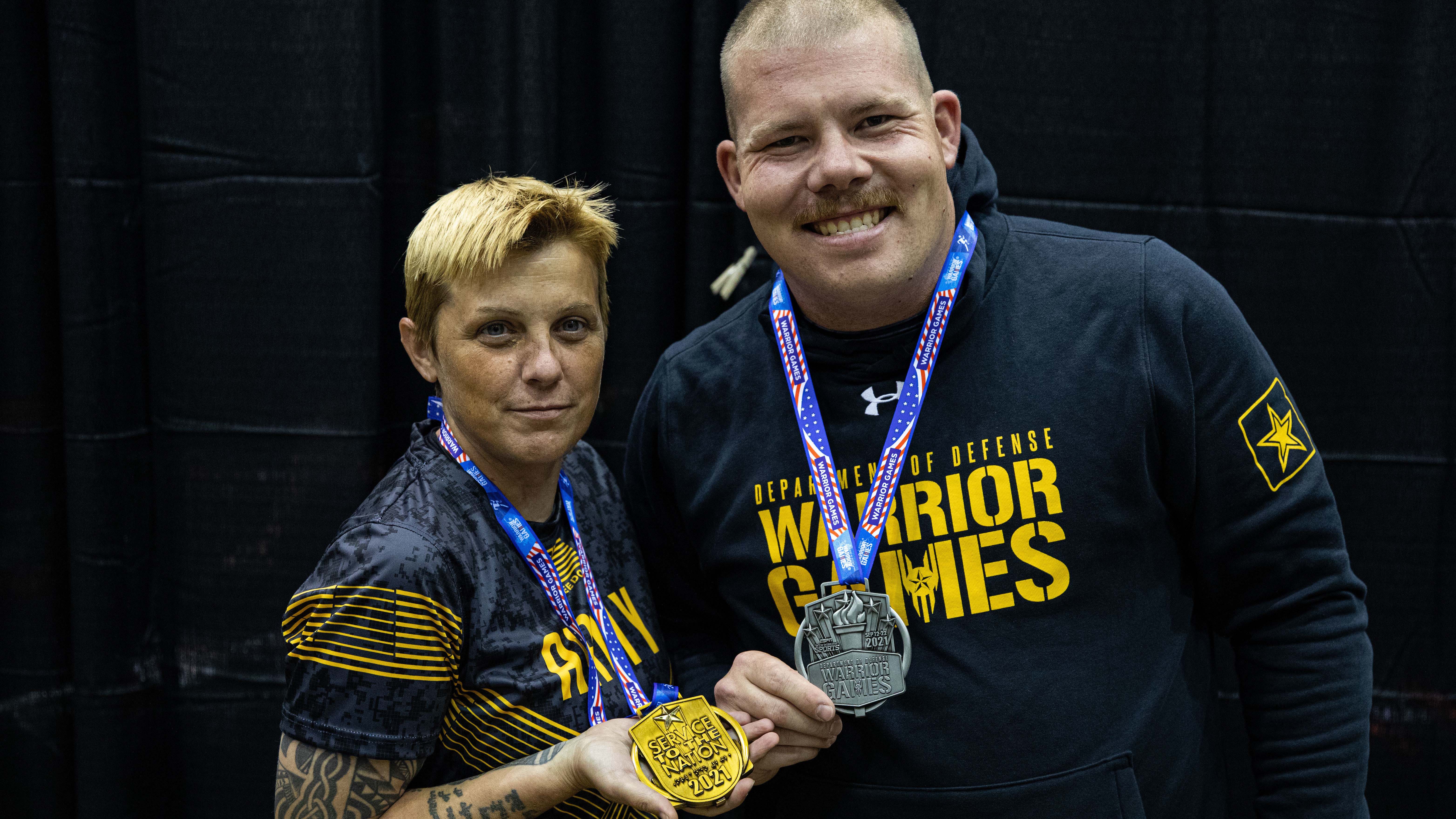 Soldiers celebrate their Warrior Games medals