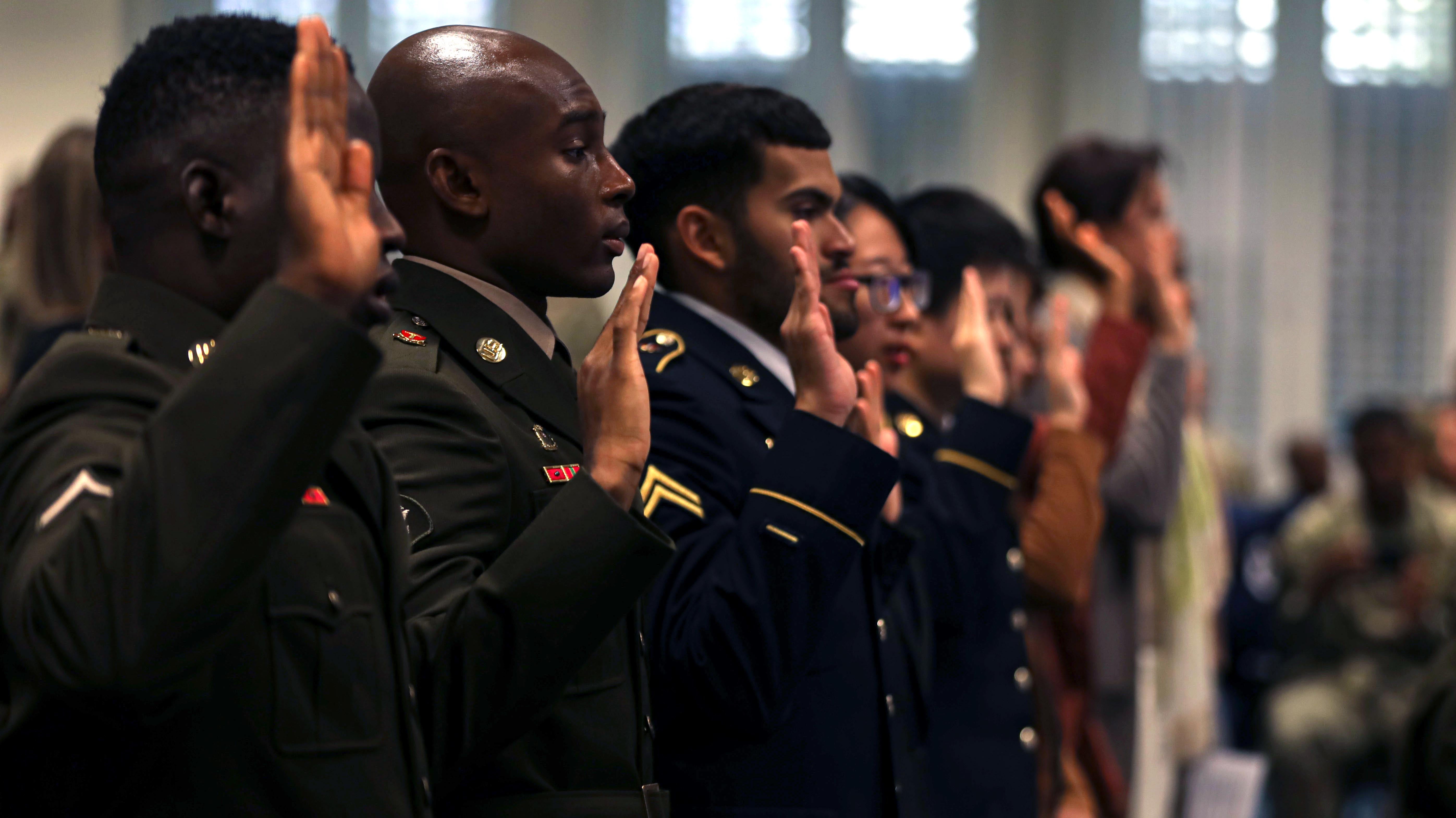 Soldiers taking oath of citizenship