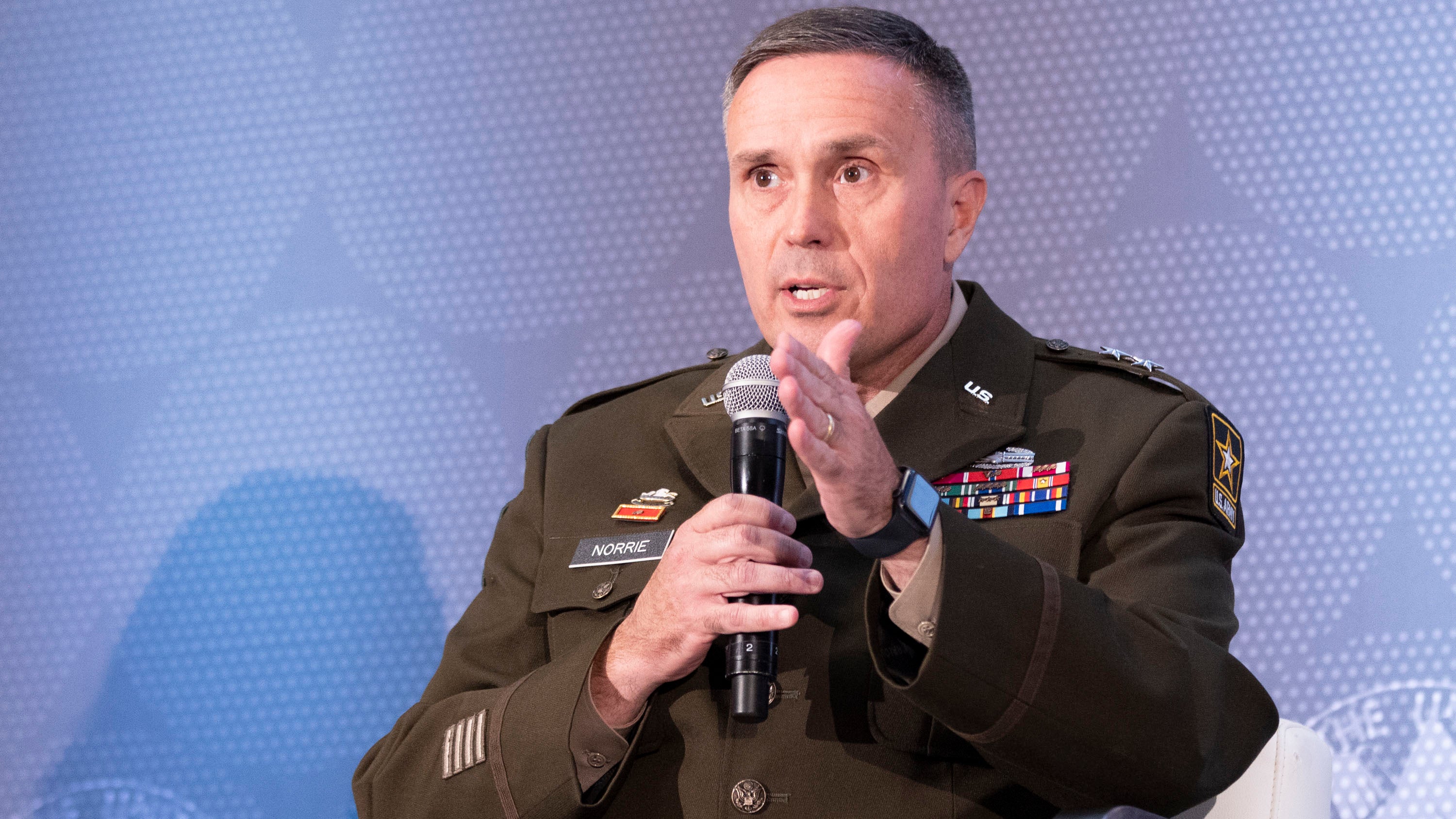 Maj. Gen. Christopher Norrie, director of the People First Task Force, speaks during the AUSA Contemporary Military Forum: People First at the AUSA 2022 Annual Meeting in Washington, D.C., Monday, Oct. 10, 2022. (Tasos Katopodis for AUSA)