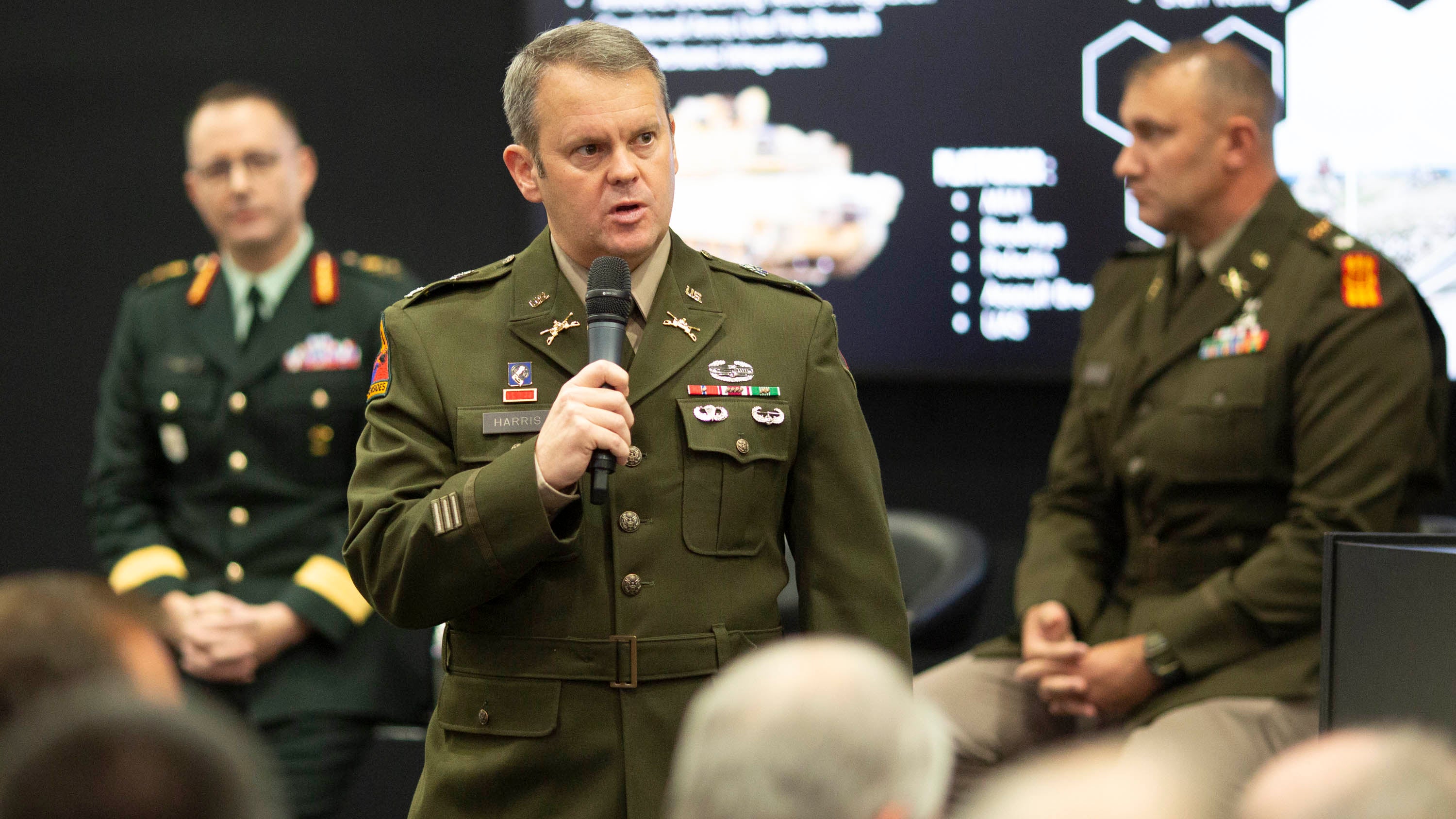 Col. Bryan Harris, commander of the 2nd Armored BCT, 1st Infantry Division, speaks during a Warriors Corner session about training Ukraine’s military at the AUSA 2023 Annual Meeting in Washington, D.C., Tuesday, Oct. 10, 2023. (Mike Morones for AUSA)