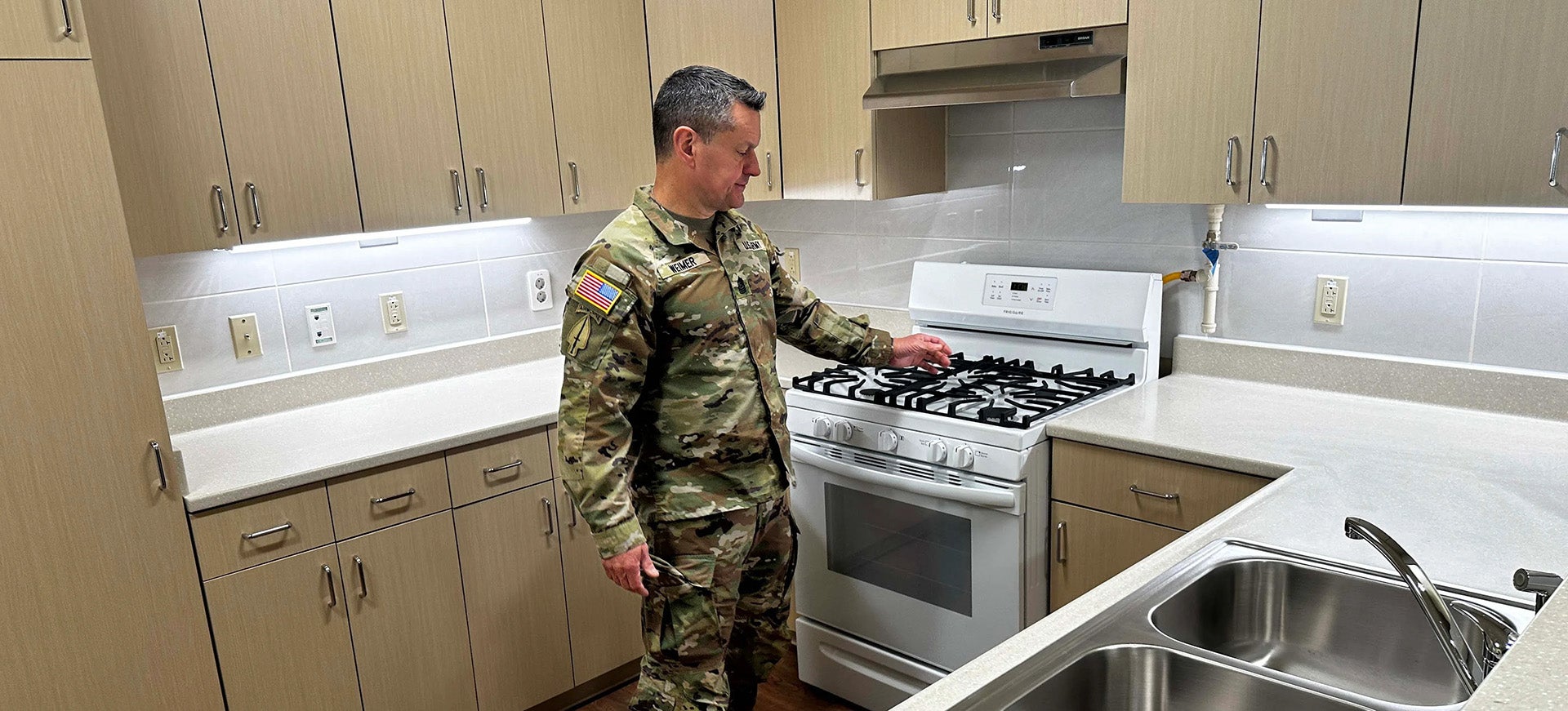 Soldier in kitchen.