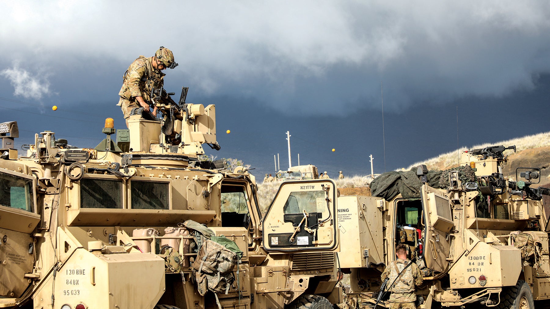 Soldiers with the 130th Engineer Brigade, 8th Theater Sustainment Command, conduct maintenance on vehicles and weapon systems at Pohakuloa Training Area, Hawaii. (Credit: U.S. Army/Sgt. 1st Class Joshua Brandenburg)