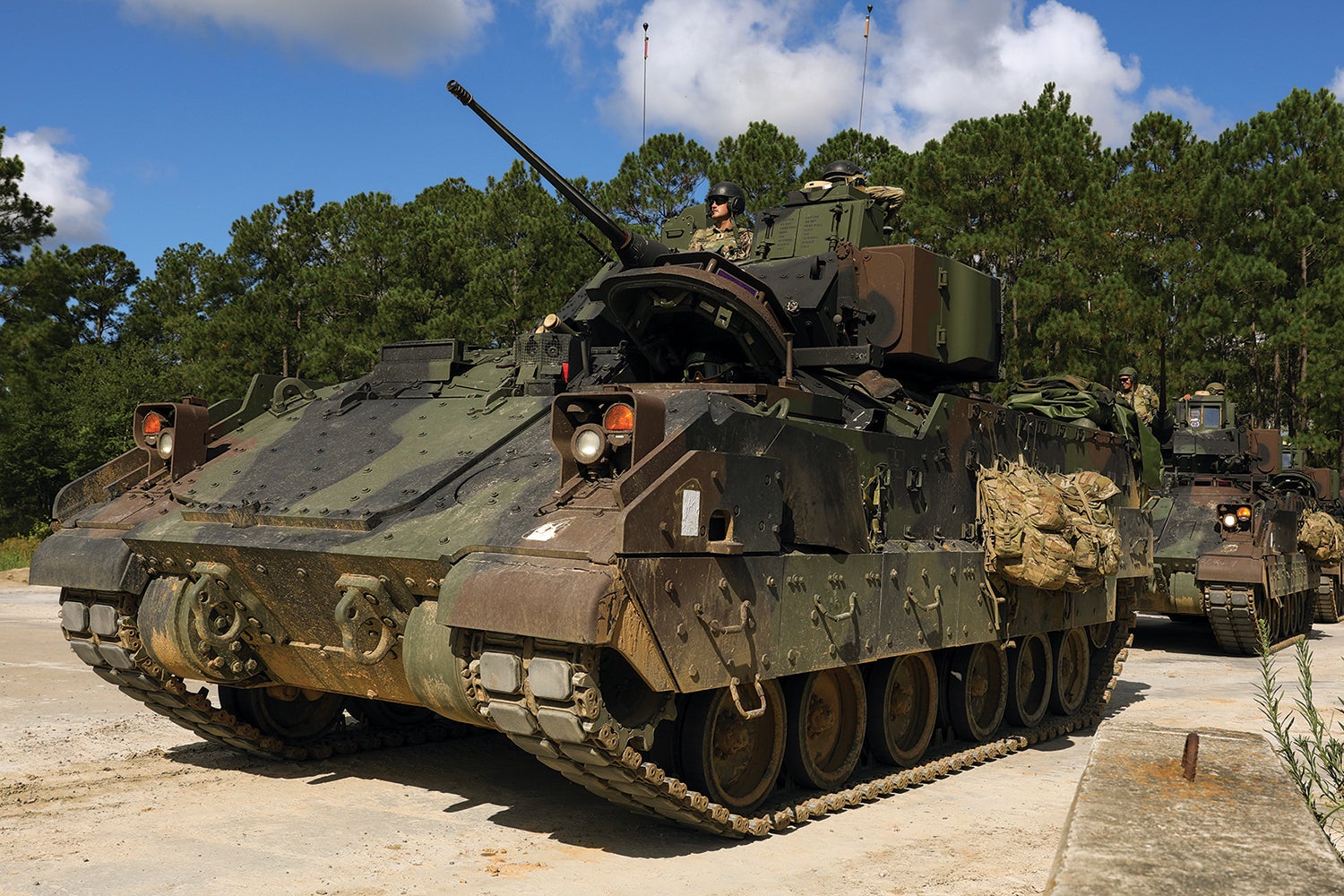 Soldiers with the 1st Armored Brigade Combat Team, 3rd Infantry Division, prepare their Bradley Fighting Vehicles for a live-fire exercise at Fort Stewart, Georgia. (Credit: U.S. Army/Spc. Duke Edwards)