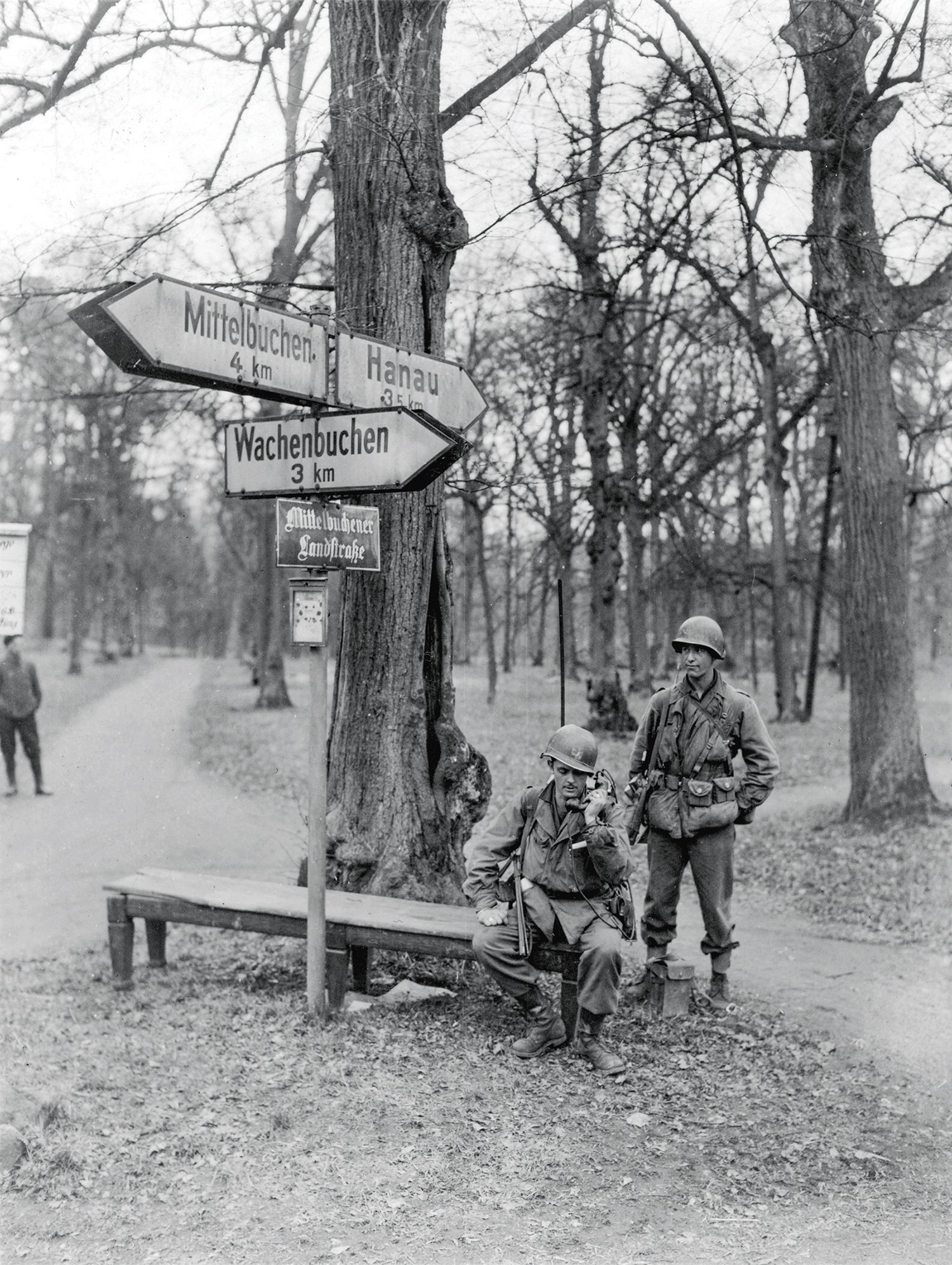 Soldiers from the 358th Infantry Regiment, 90th Infantry Division, test their radios in March 1945 in Germany. (Credit: U.S. Army)