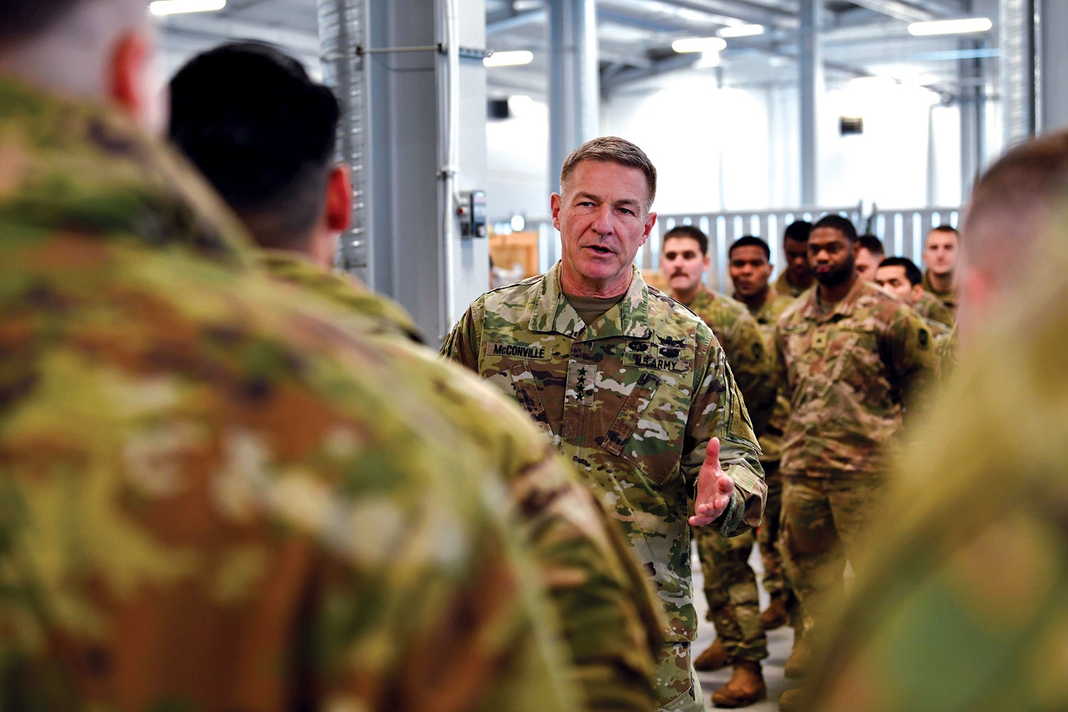 Army Chief of Staff Gen. James McConville speaks with soldiers deployed to Poland in December. (Credit: U.S. Army/Master Sgt. Joseph Moore)