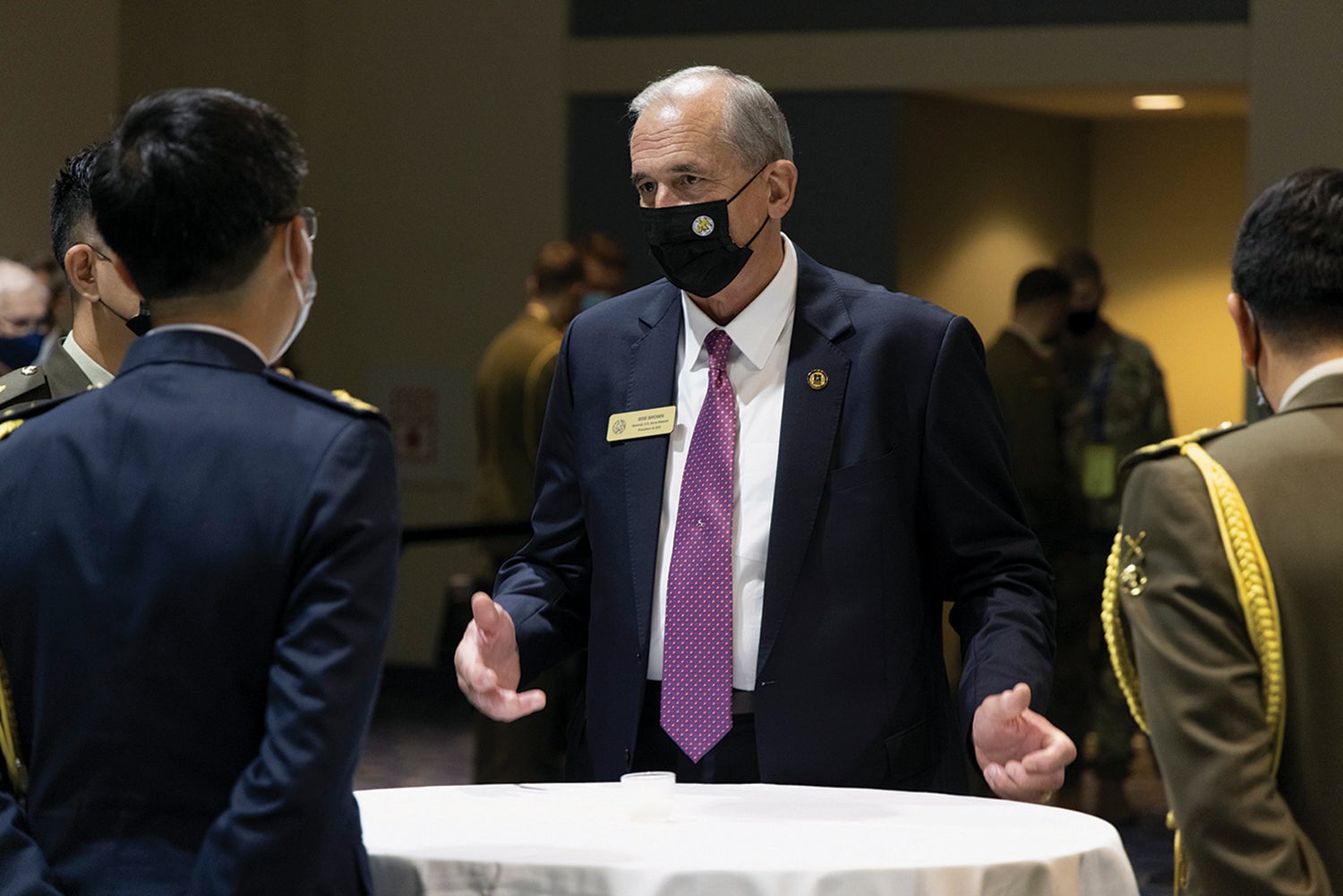 Association of the U.S. Army President and CEO retired Gen. Bob Brown speaks with foreign military representatives during AUSA’s 2021 Annual Meeting and Exposition in Washington, D.C. (Credit: AUSA/Mike Morones)