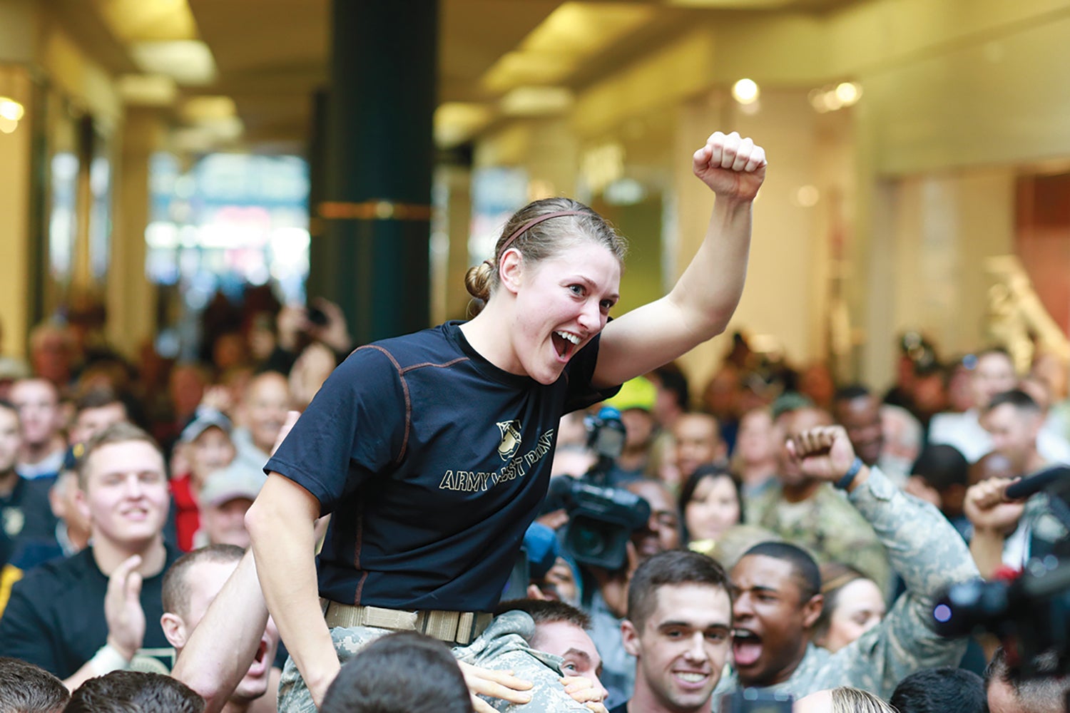 Shaina Coss, the first woman to lead Army Rangers in combat, at a pep rally before the 2015 Army-Navy football game. (Credit: U.S. Army/David Swanson)