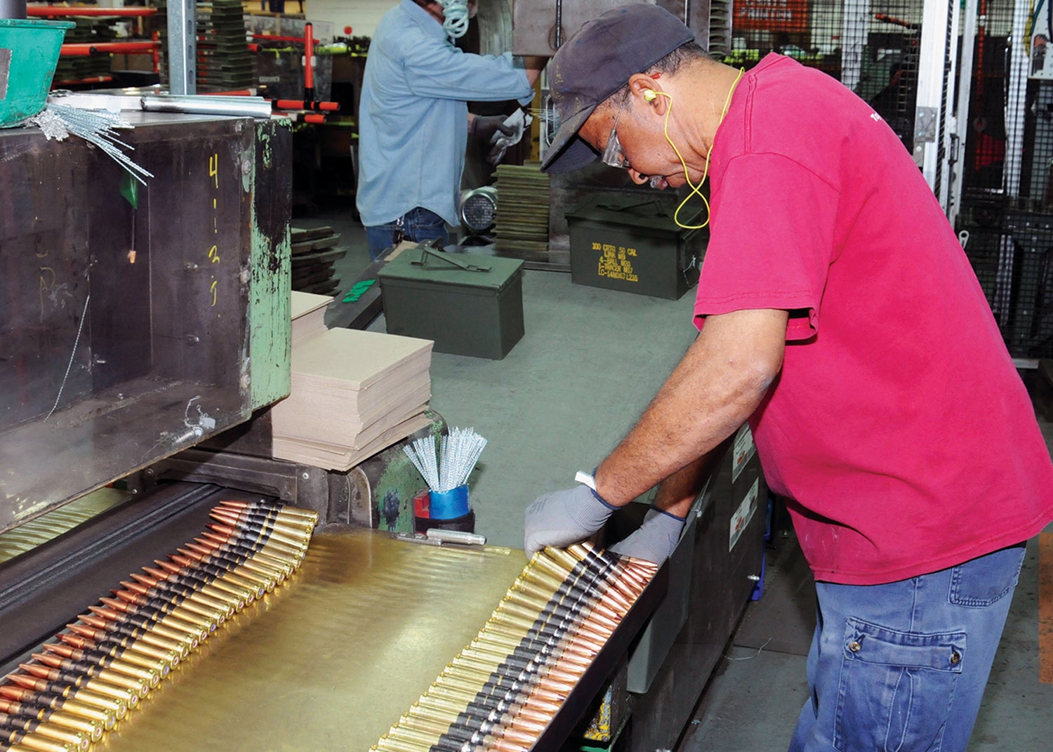A worker inspects ammunition at Lake City Army Ammunition Plant, Missouri. (Credit: U.S. Army/Dori Whipple)