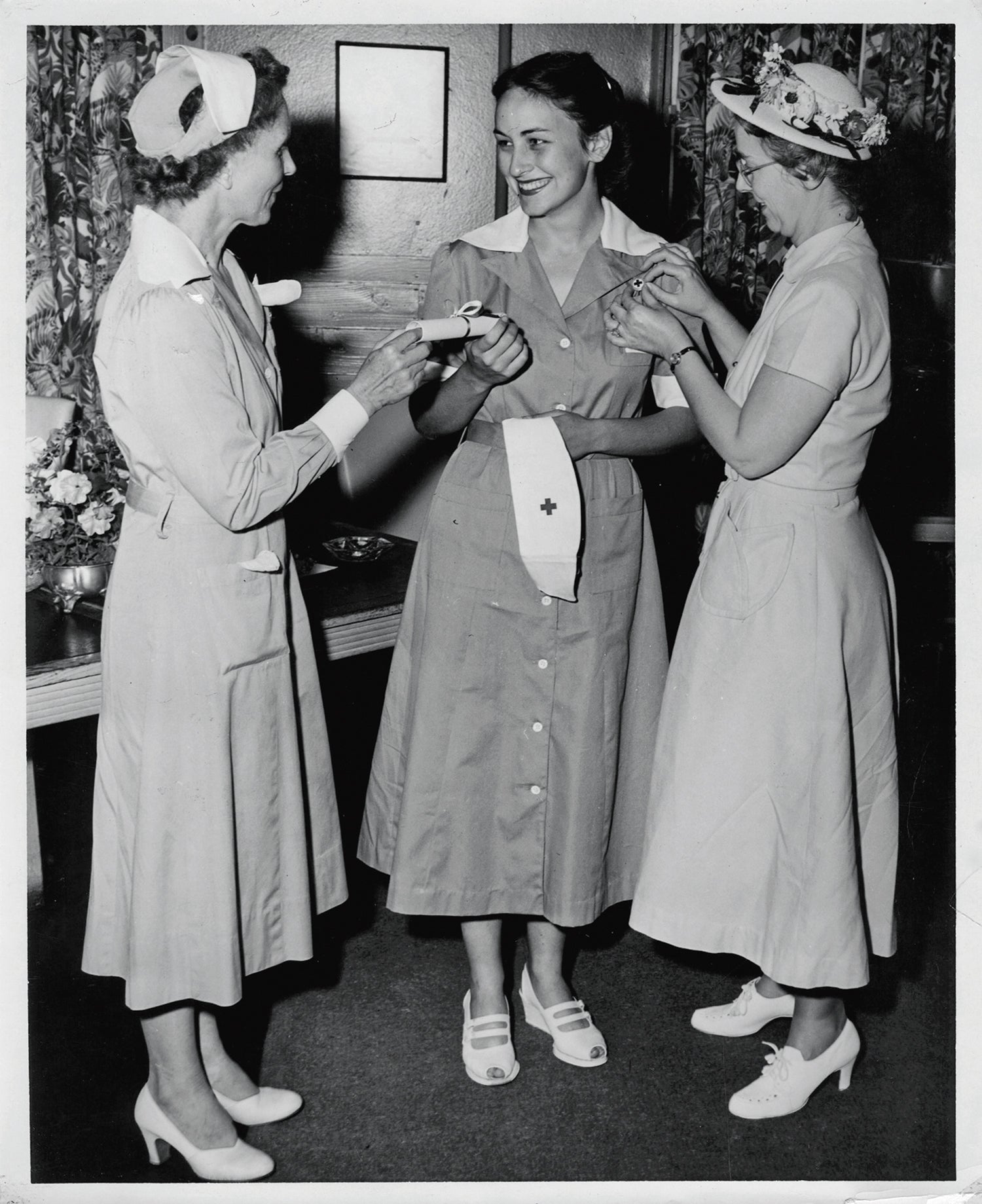 Julie Moore, center, becomes a Red Cross volunteer in 1950. (Credit: Courtesy photo)