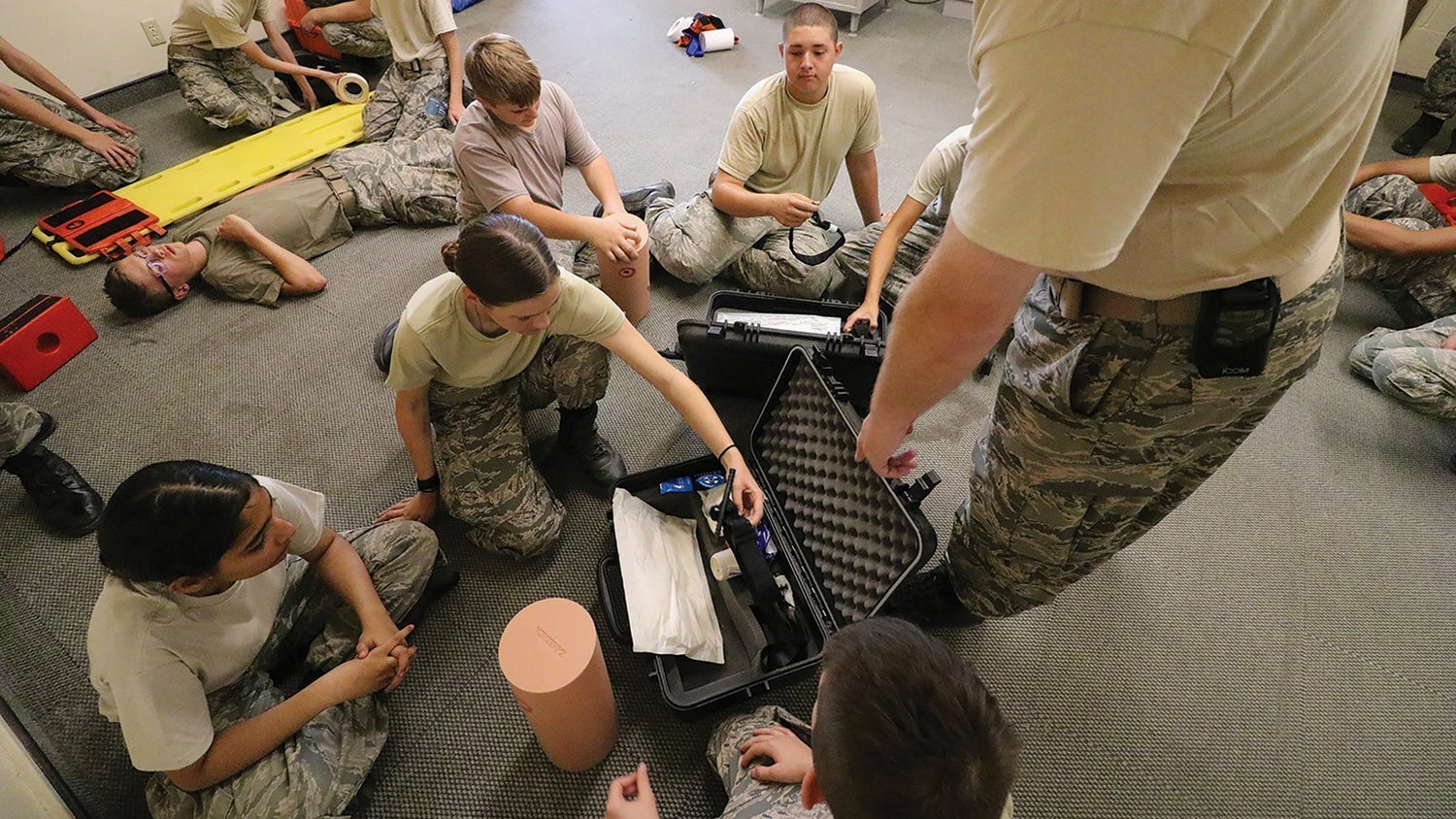At Fort Huachuca, Arizona, Civil Air Patrol cadets learn how to ready wounded troops for transport. (Credit: Civil Air Patrol/2nd Lt. Mitch Smith)