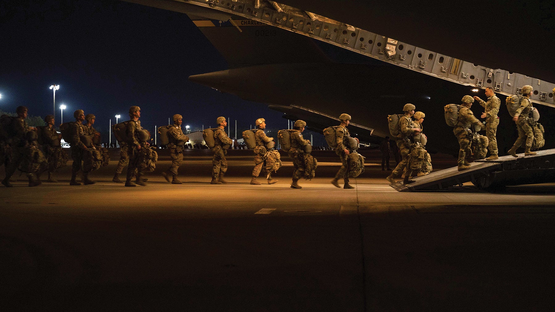 Paratroopers with the 82nd Airborne Division board a C-17 Globemaster III cargo aircraft at Pope Army Airfield, North Carolina, during a training exercise. (Credit: U.S. Air Force/Airman 1st Class Charles Casner)