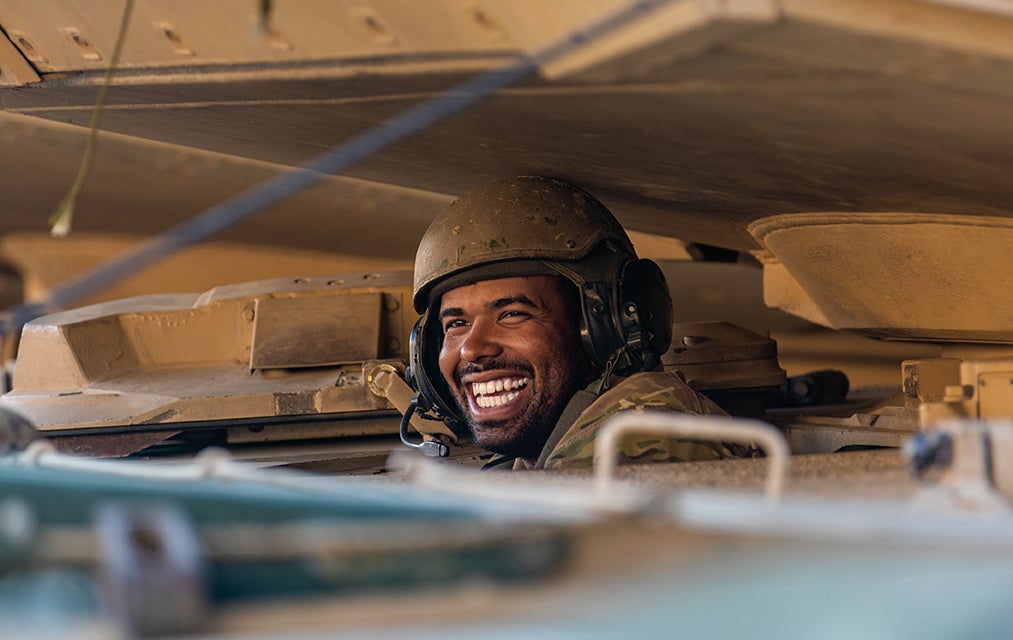 Spc. Kelvin Camilo of the 1st Armored Brigade Combat Team, 1st Infantry Division, prepares his tank for a competition in Greece. (Credit: U.S. Army/Staff Sgt. Jennifer Reynolds)