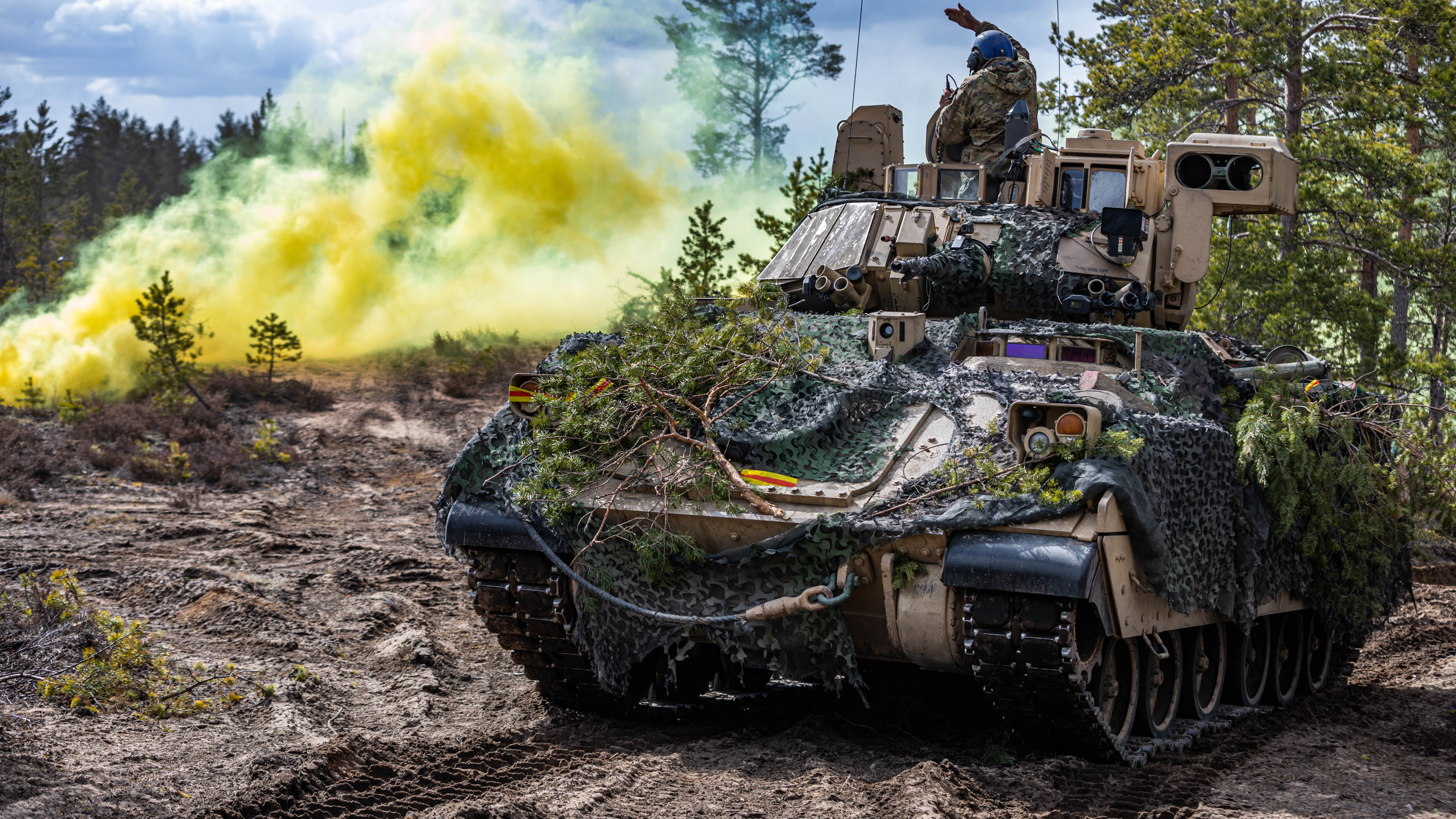 Soldiers with the 2nd Armored Brigade Combat Team, 1st Cavalry Division, maneuver an M2 Bradley Fighting Vehicle during an exercise in Niinisalo, Finland. (Credit: U.S. Army/Sgt. John Schoebel)