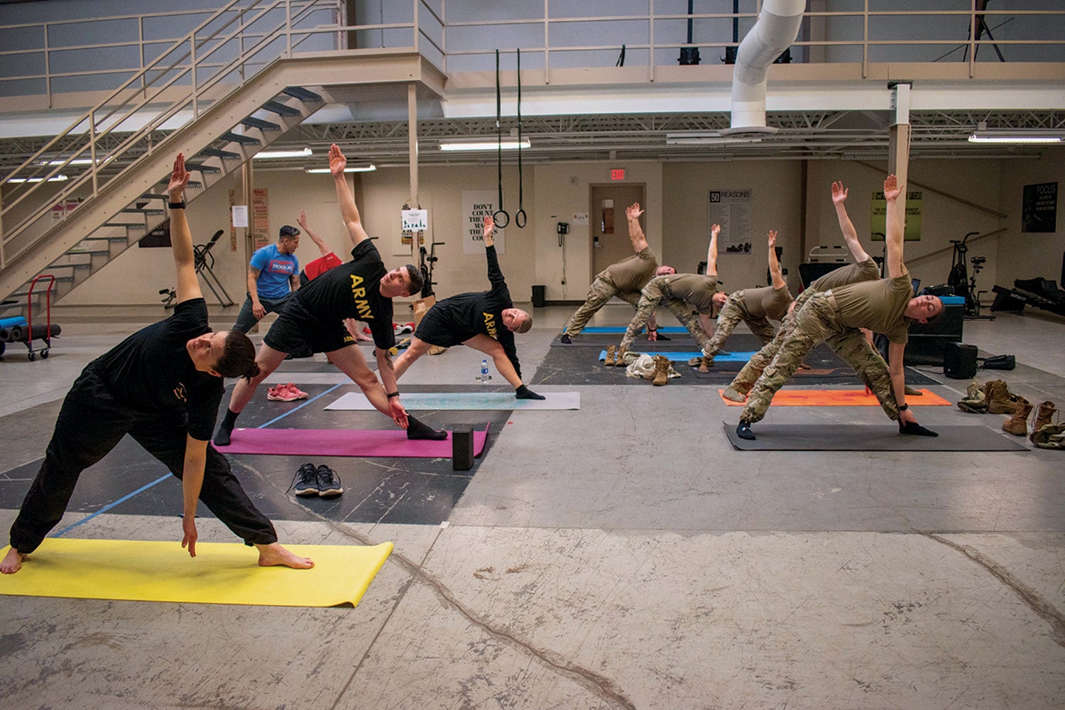 Soldiers take a combat mobility yoga class at Joint Base Lewis-McChord, Washington. (Credit: U.S. Army/Sgt. Casey Hustin)