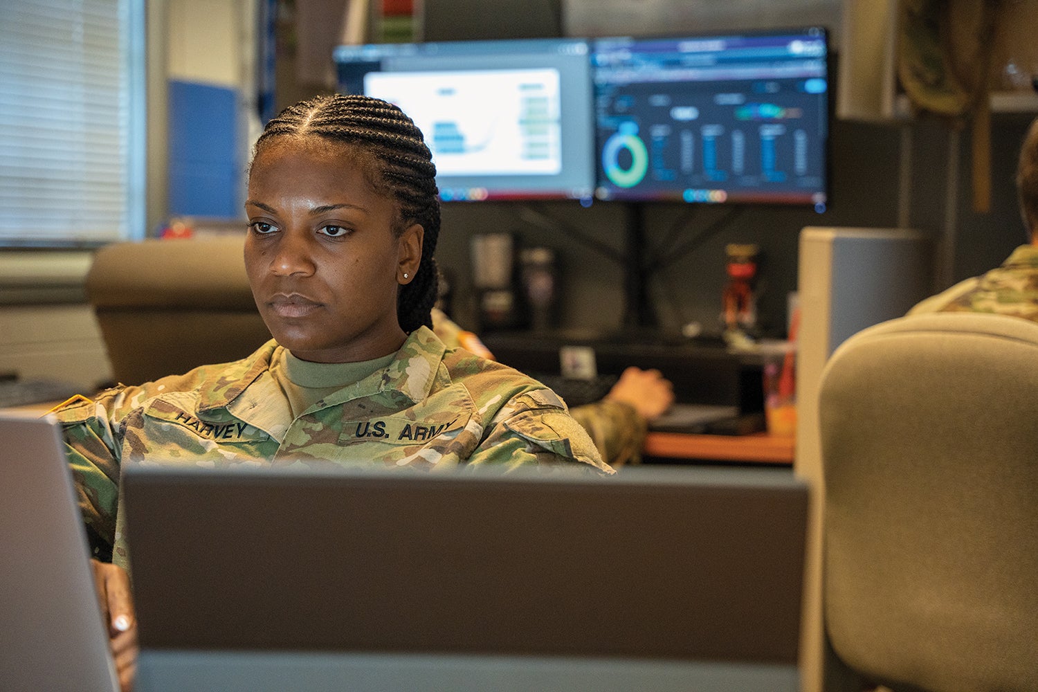 First Lt. Briana Harvey, of the Maryland Army National Guard, monitors network activity during a cyber exercise at the Laurel Readiness Center, Maryland. (Credit: Army National Guard/Sgt. Tom Lamb)