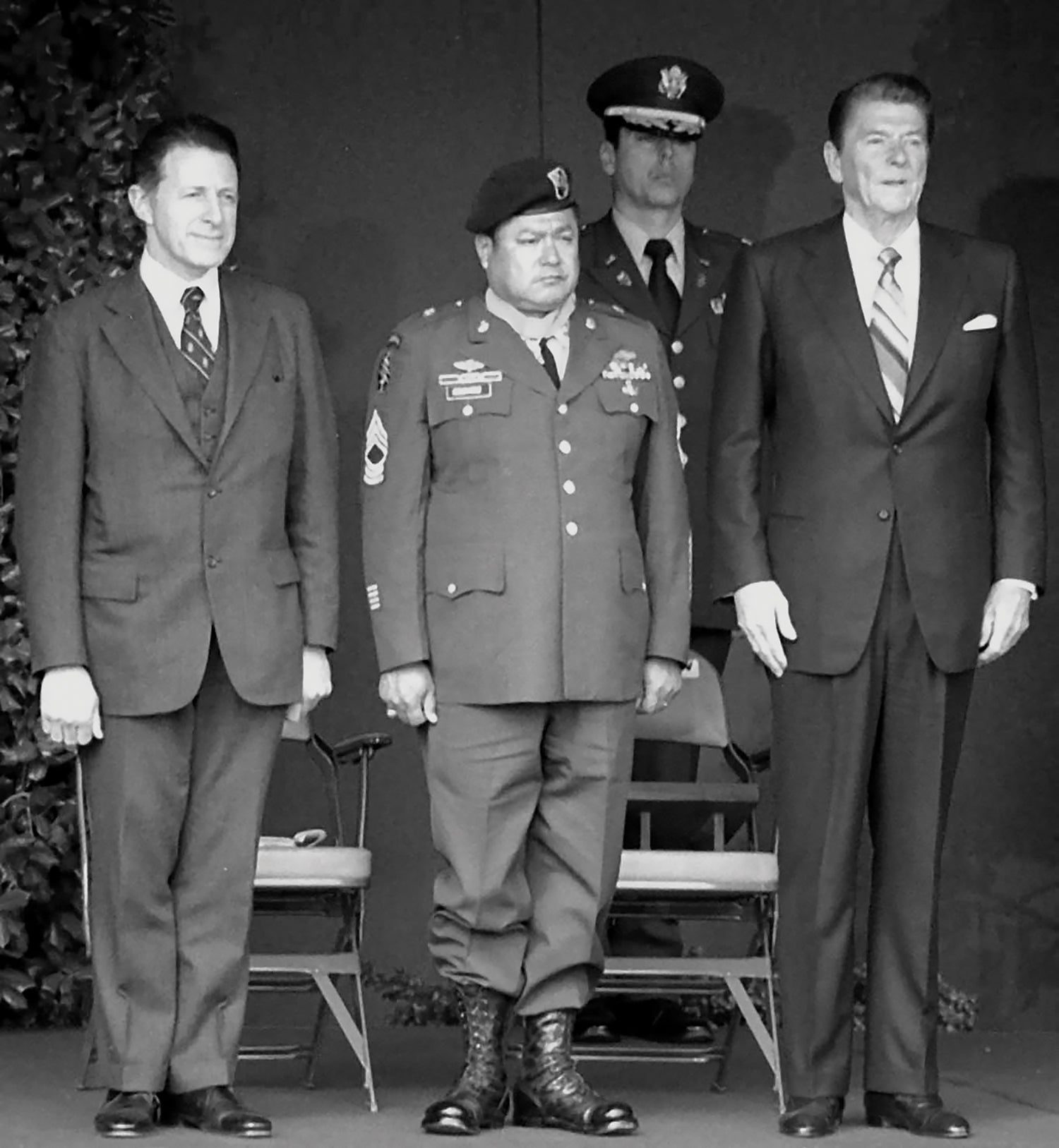 Master Sgt. Roy Benavidez, center, is flanked by Secretary of Defense Caspar Weinberger, left, and President Ronald Reagan at his Medal of Honor ceremony on Feb. 24, 1981. (Credit: Wikipedia/U.S. Air Force)