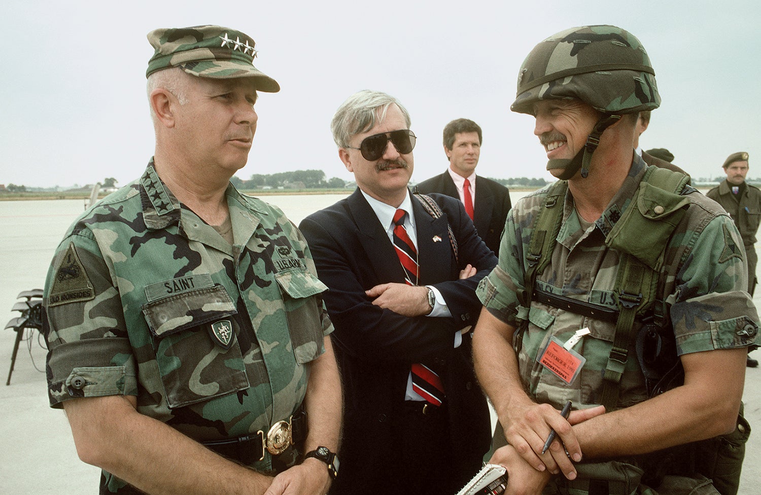 Gen. Crosbie Saint, left, then commander of U.S. Army Europe, talks with an Army journalist at the Amsterdam airport while awaiting the arrival of an Army unit that would participate in the 1991 iteration of the REFORGER exercise. (Credit: U.S. Army/Thomas Hamilton III)