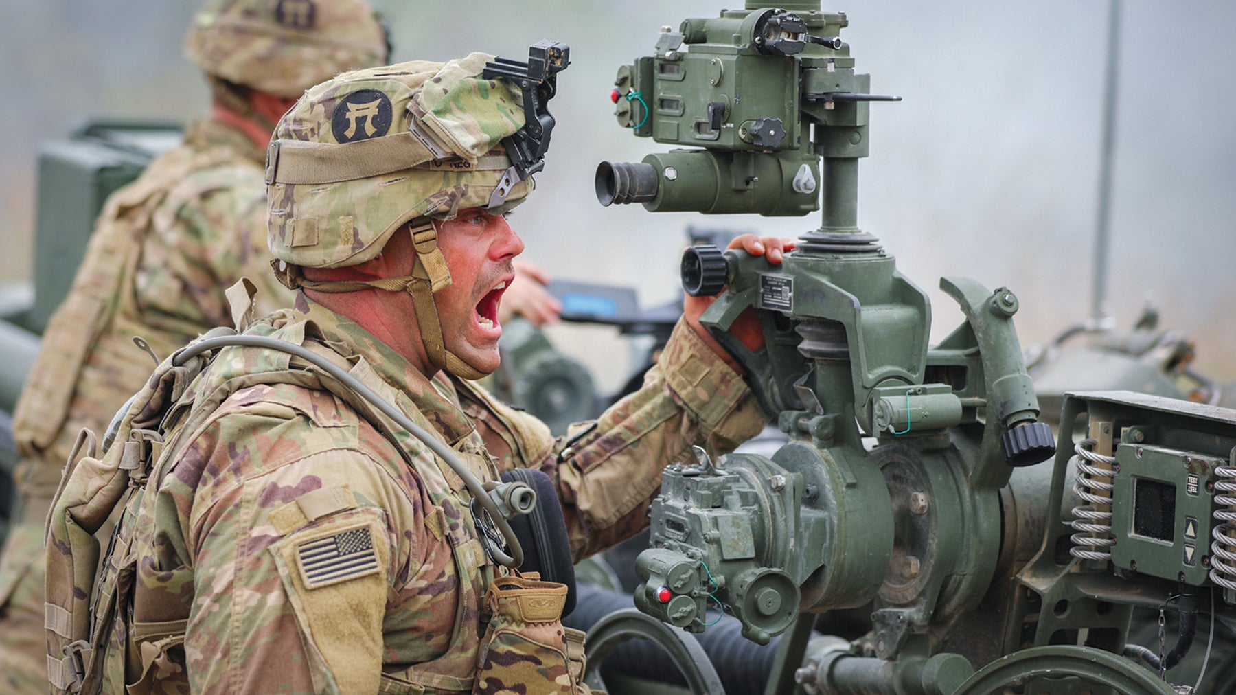 Sgt. Joseph Kammerer, of the 3rd Brigade Combat Team, 101st Airborne Division (Air Assault), shouts commands during live-fire training at Fort Knox, Kentucky. (Credit: U.S. Army/Staff Sgt. Michael Eaddy) 