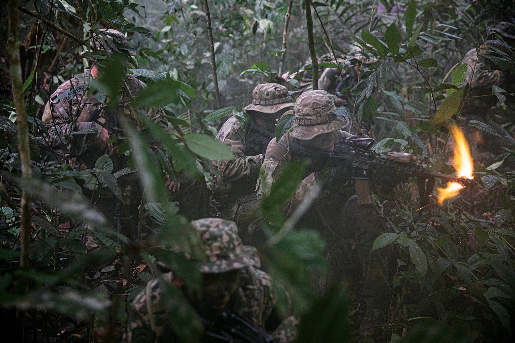 Soldiers from the 3rd Infantry Brigade Combat Team, 25th Infantry Division, and Malaysian troops train together during an exercise in a Malaysian jungle. (Credit: U.S. Army/Pfc. Wyatt Moore)