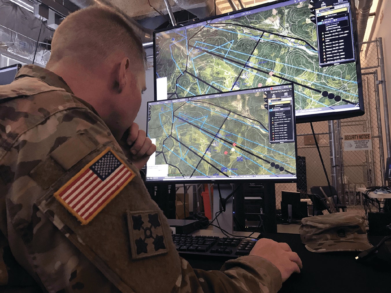 A Soldier plans an exercise using the One World Terrain system.