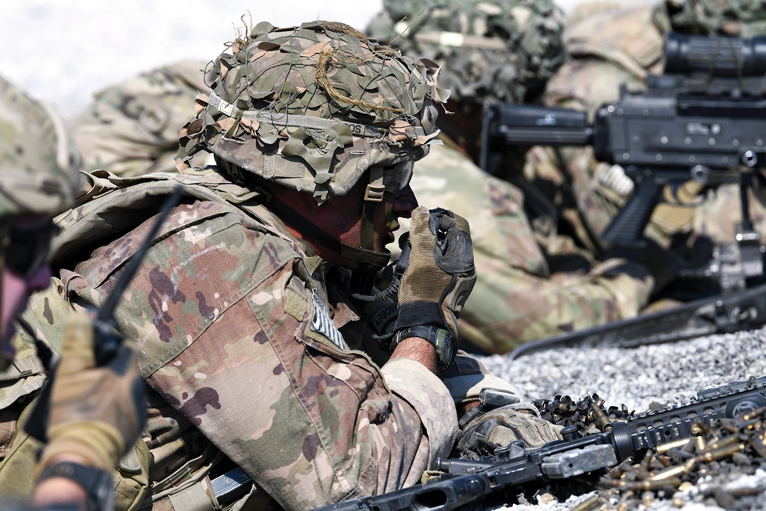 A paratrooper with the 173rd Airborne Brigade uses a radio during a live-fire exercise in Slovenia. (Credit: U.S. Army/Paolo Bovo)