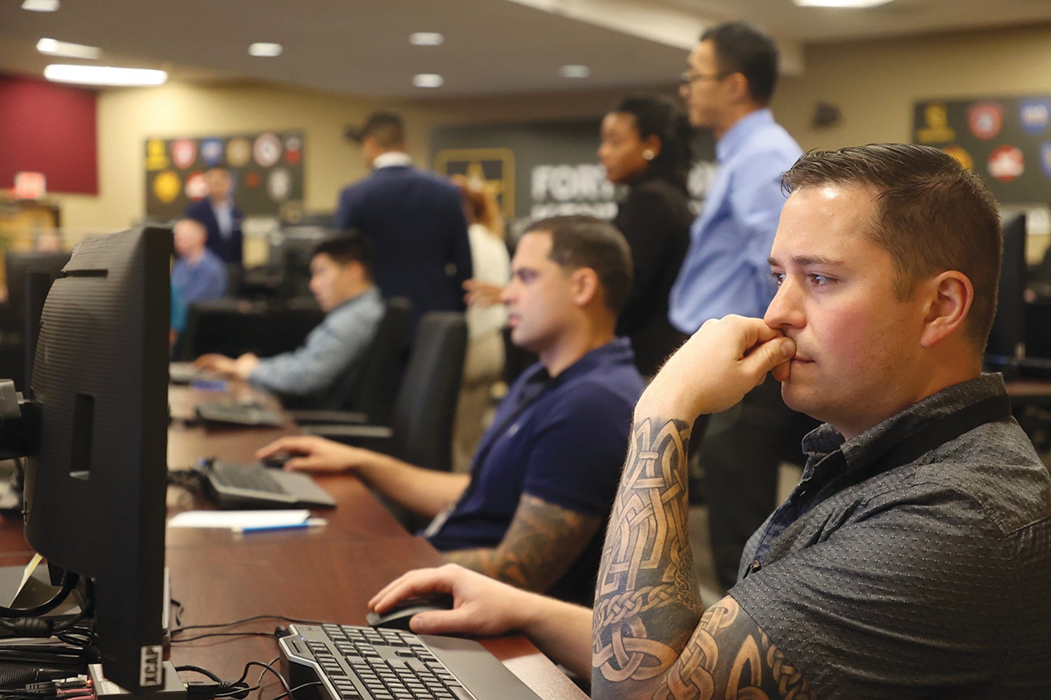 Cadre members test the computers that will be used during the 2023 season of the  Army’s Command Assessment Program at Fort Knox, Kentucky. (Credit: U.S. Army/Eric Pilgrim)