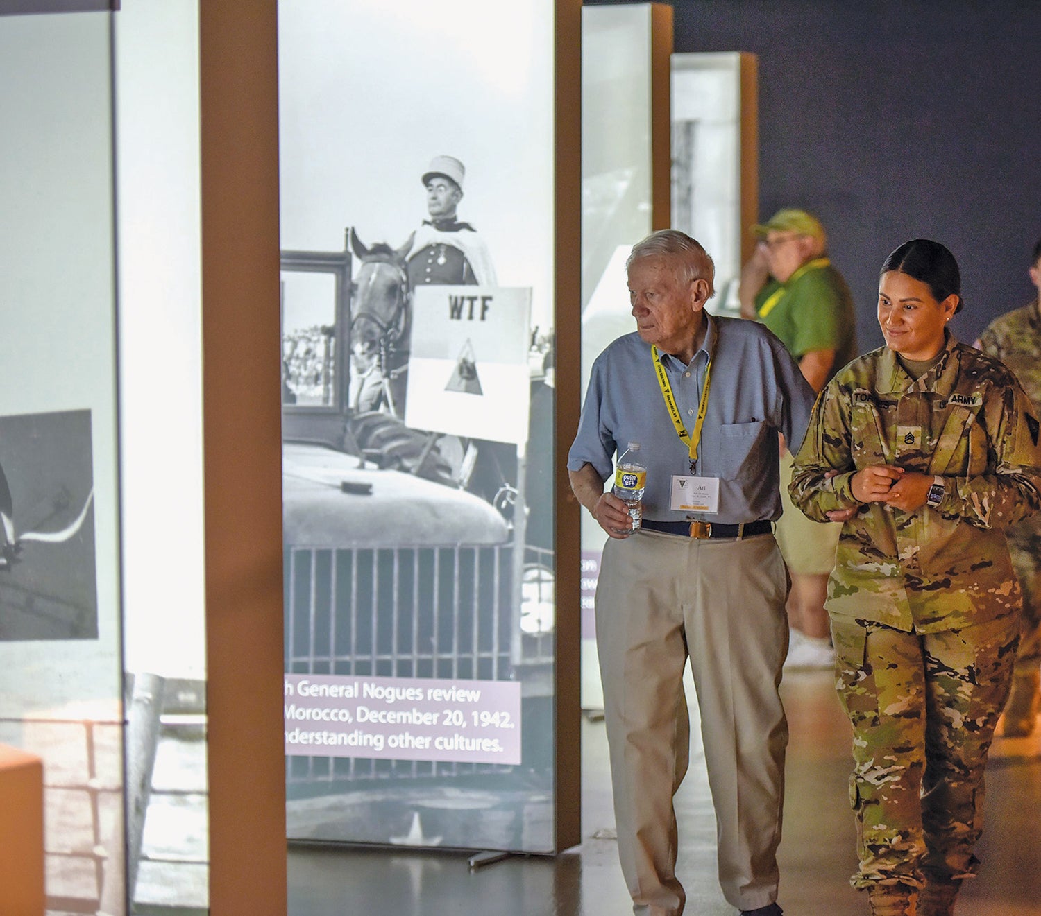 Staff Sgt. Alice Torres, right, escorts former Pvt. Arthur Jacobson, another 83rd veteran, during a tour of the General George Patton Museum, Fort Knox. (Credit: U.S. Army/Charles Leffler)
