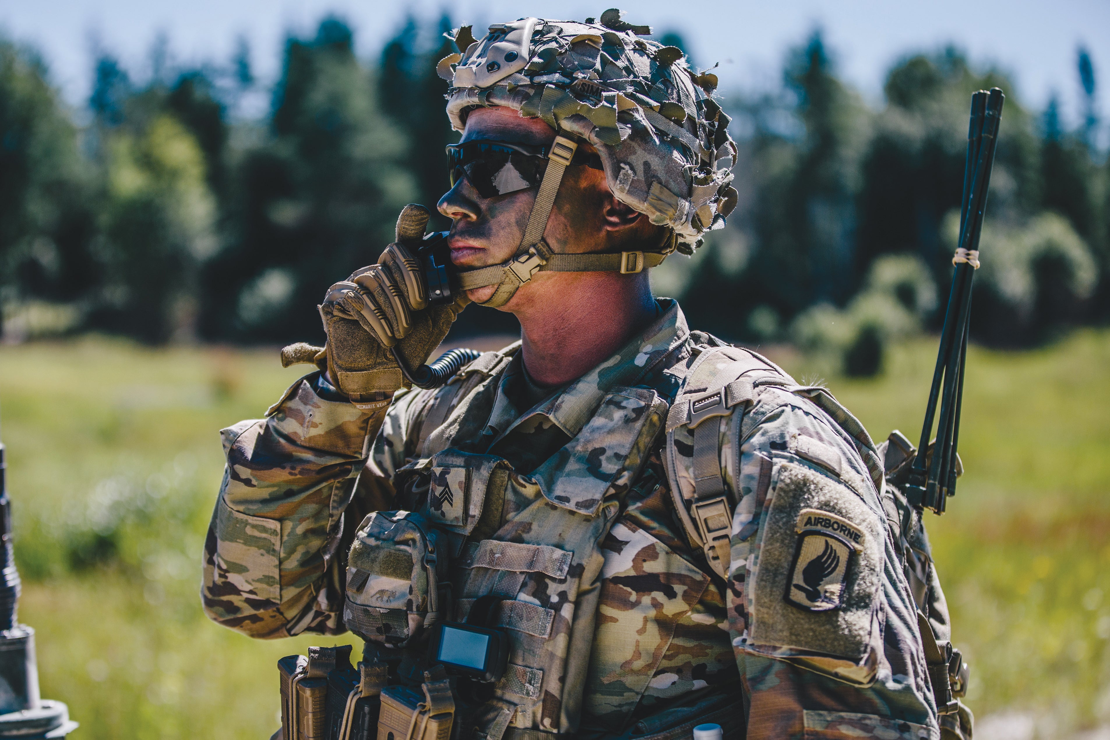 A paratrooper with the 173rd Airborne Brigade coordinates firing positions during an exercise at Grafenwoehr Training Area, Germany. (Credit: U.S. Army/Spc. Ryan Lucas)