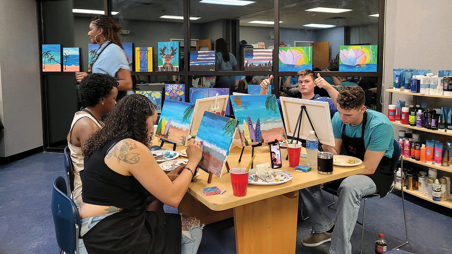 Budding artists work on seascapes during a Fort Jackson, South Carolina, Better Opportunities for Single Soldiers event. (Credit: U.S. Army/Emily Hileman)