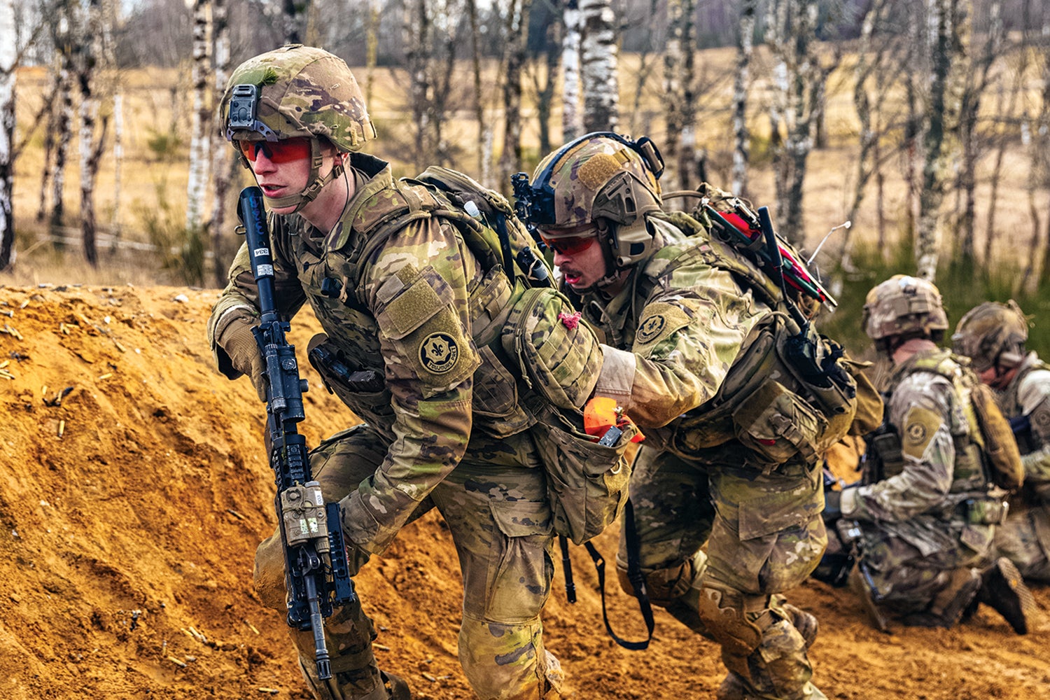 This page: Soldiers with the 3rd Squadron, 2nd Cavalry Regiment, train in Vilseck, Germany. (Credit: U.S. Army Reserve/Sgt. Kenneth Rodriguez.)