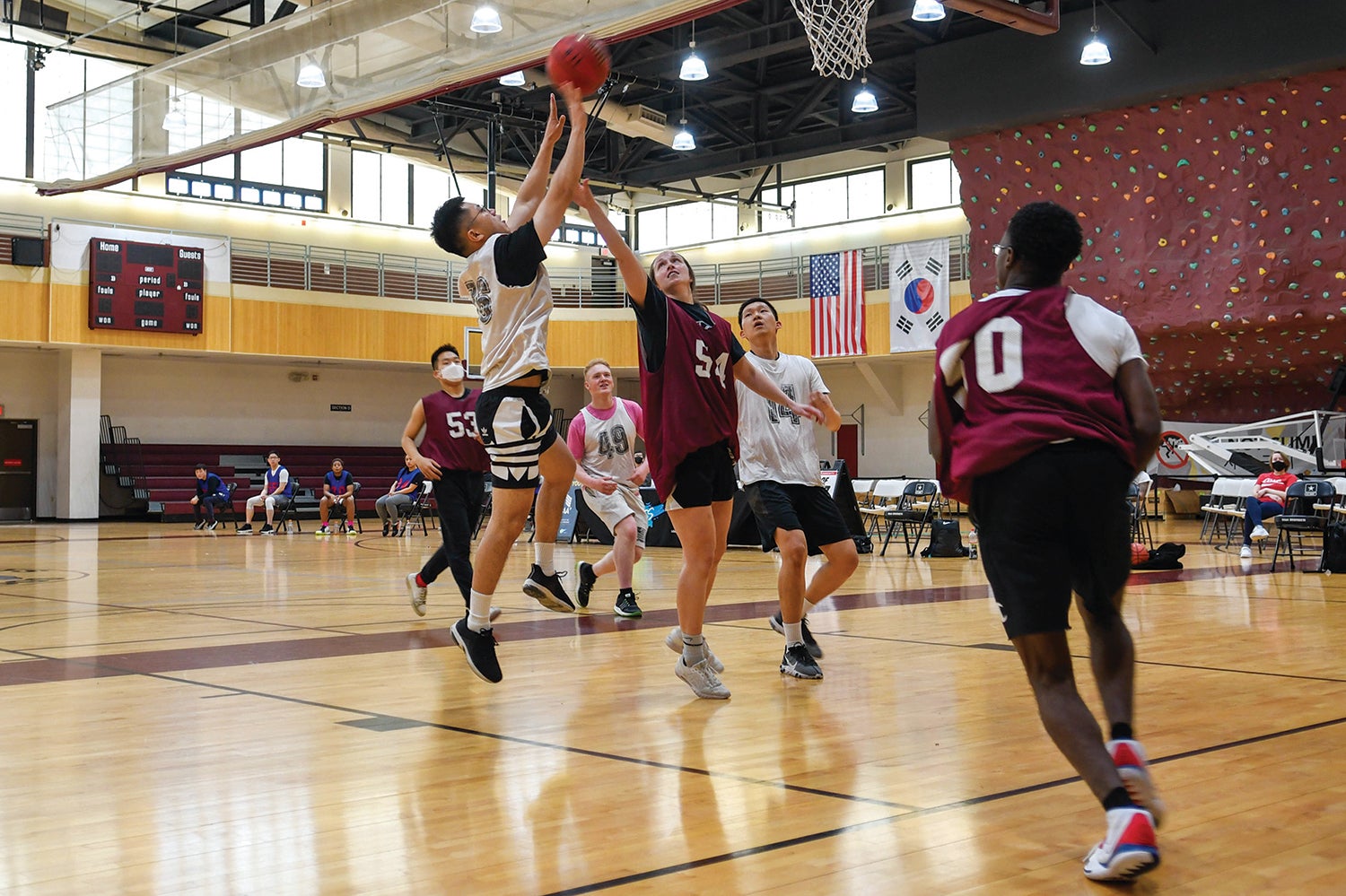 Soldiers at U.S. Army Garrison Humphreys, South Korea, play in a Better Opportunities for Single Soldiers basketball tournament. (Credit: U.S. Army/Spc. Brooke Davis).