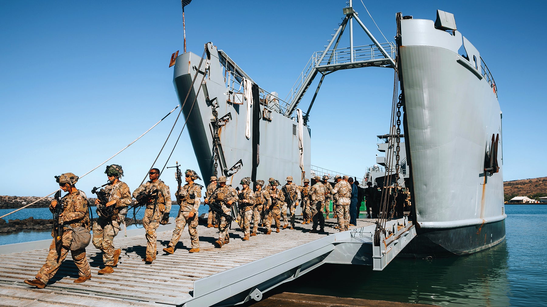 Soldiers from the 3rd Brigade Combat Team, 25th Infantry Division, disembark from the Army’s Gen. Brehon B. Somervell Logistics Support Vessel in Hawaii. (Credit: U.S. Army/Spc. Rachel Christensen)