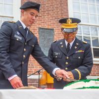 Oldest and yougest soldier cake cutting