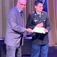 Bob Farquar presents JROTC medal to Cadet Arpit Niraula from Henry Clay H.S.