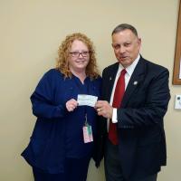 Frank Cannova presents donation to Lexington Chapter of the Nurses Organization of the VA.