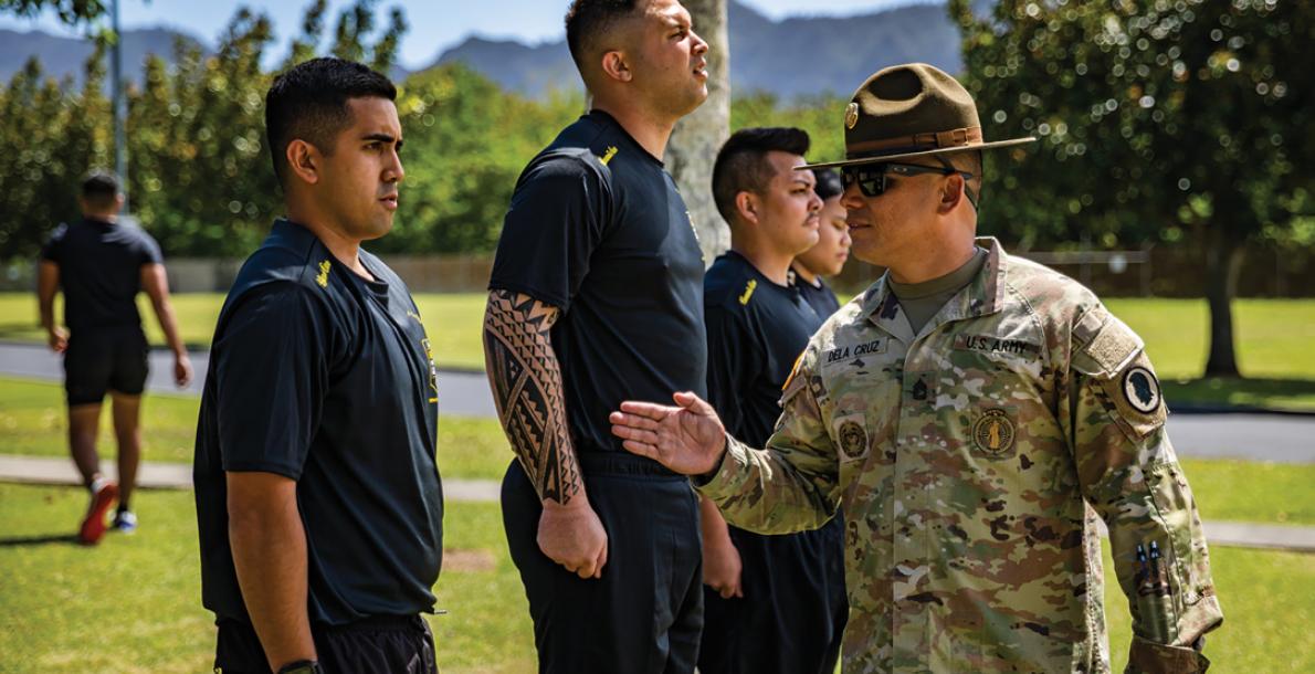 Sgt. 1st Class Landen Dela Cruz, right, a drill sergeant with the Hawaii Army National Guard’s Recruiting and Retention Battalion, instructs recruits at the Regional Training Institute, Waimanalo. (Army National Guard/Sgt. Lianne Hirano)