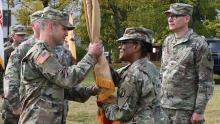 Col. Dean Roberts, left, receives the colors from Brig. Gen. Wanda Williams, commander of the U.S. Army Reserve’s 7th Mission Support Command, as he takes command of the 7th’s 510th Regional Support Group in Germany. (Credit: U.S. Army/Elisabeth Paqué)