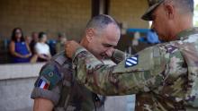 Cottereau is inducted into the Order of Saint George in July 2021 by 3rd Infantry Division commander Maj. Gen. Charles Costanza. (Credit: U.S. Army/Pfc. Caitlin Wilkins)