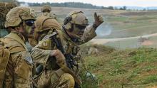 First Sgt. Joseph Keienburg, right, of the 1st Battalion, 503rd Infantry Regiment, 173rd Airborne Brigade, leads paratroopers toward an objective during a live-fire exercise at Grafenwoehr Training Area, Germany. (Credit: U.S. Army/Kevin Sterling Payne)