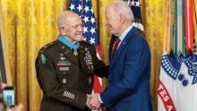 Retired Col. Paris Davis, left, is congratulated by President Joe Biden at the White House after receiving the Medal of Honor for his actions in Vietnam. (Credit: White House/Adam Schultz)