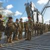 Soldiers with the 3rd Brigade Combat Team, 25th Infantry Division, are counted as they board Logistics Support Vessel General Brehon B. Somervell at Waipio Point, Hawaii. (Credit: U.S. Army/Spc. Rachel Christensen)